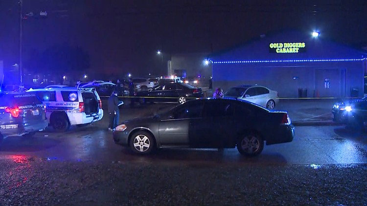 HPD searching for suspect in gold sedan after security guard shot