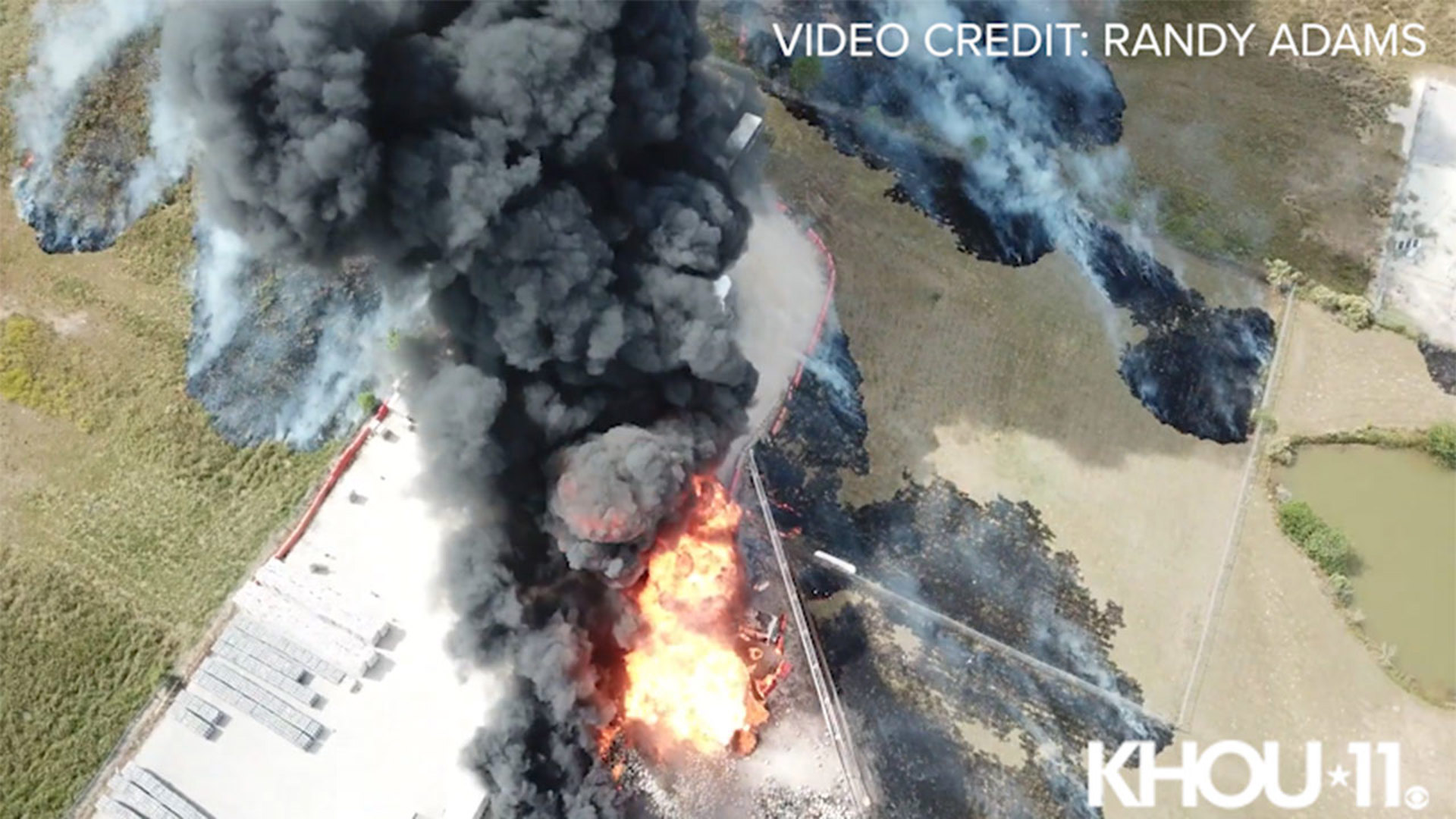 This drone video provided by Randy Adams shows the fire burning at RapidXchange propane facility in Waller County.