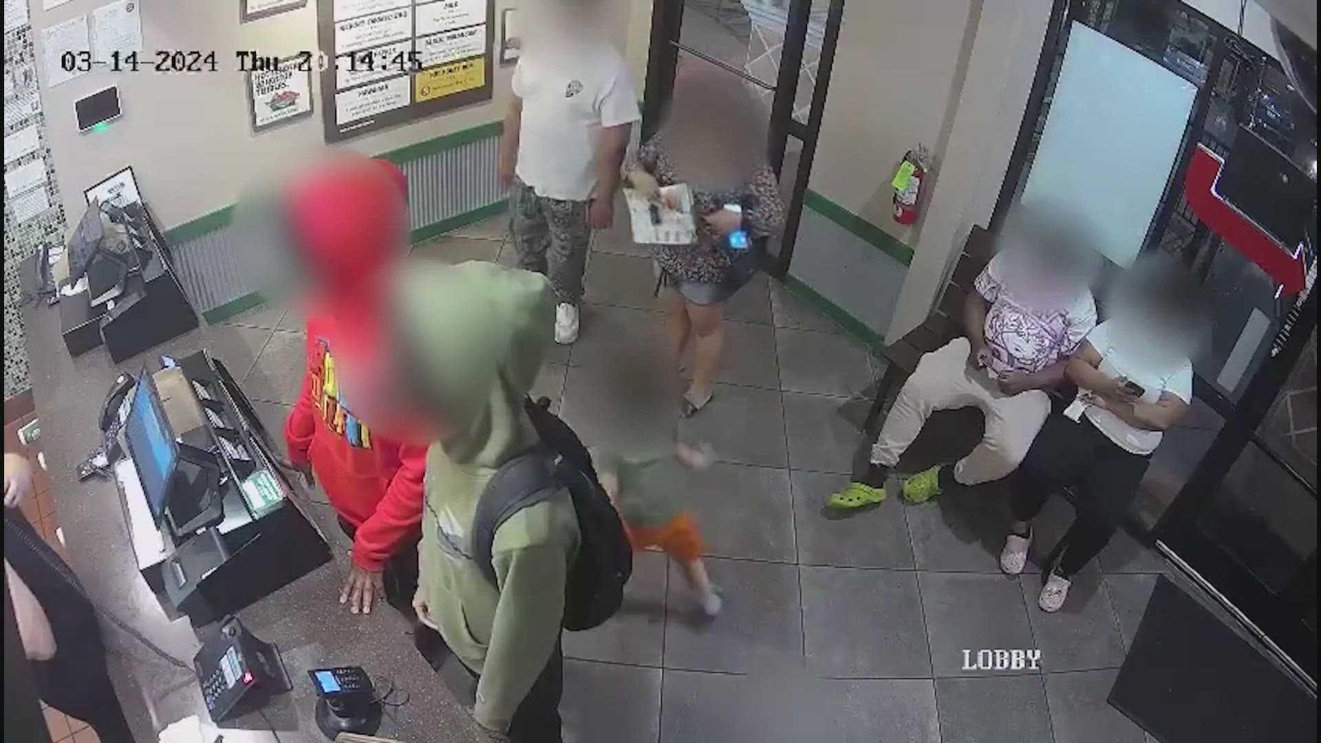 Houston police released video of the two, showing one grab a cash register on the way out.