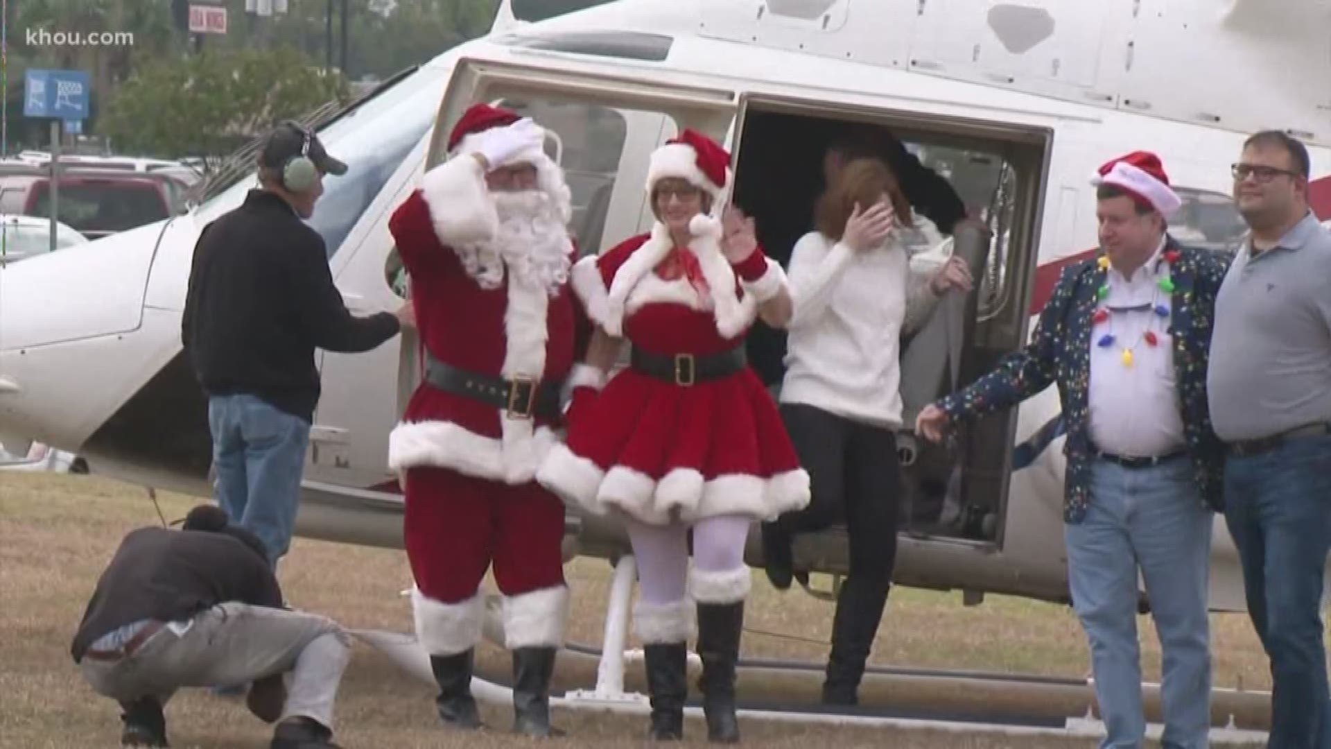 Santa Claus traded in his sleigh for a helicopter Friday. He touched down at Northline Commons mall to greet Black Friday shoppers.