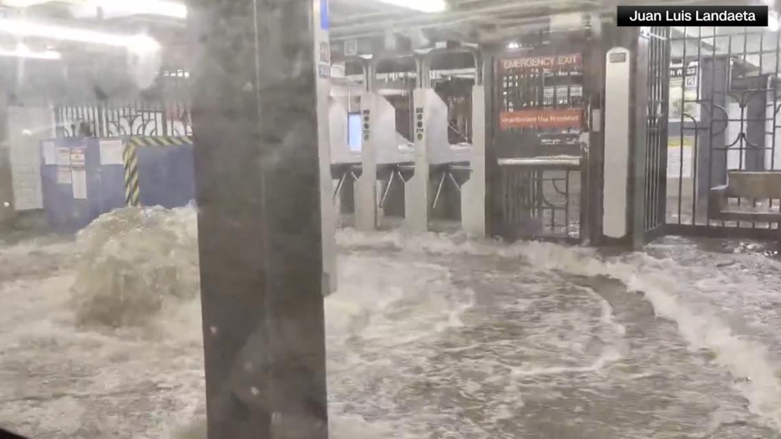 Videos show NYC subway riders trapped in floodwater as storms hit ...
