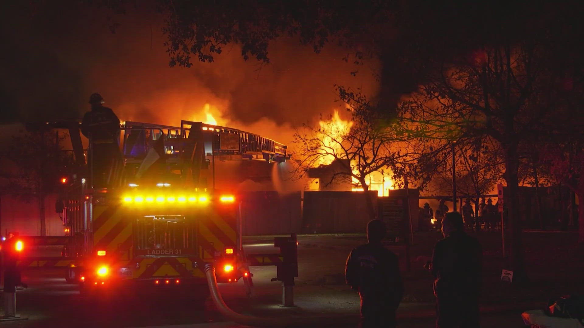 Crews battle large house fire in The Heights | khou.com