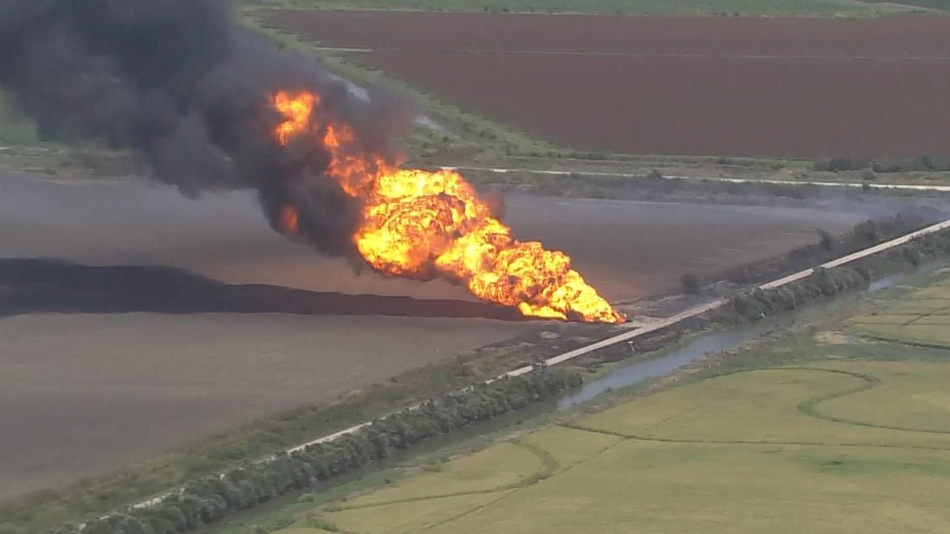 A ruptured pipeline caused a huge fire at a private oil field in Brazoria County on Thursday, July 13, 2023.