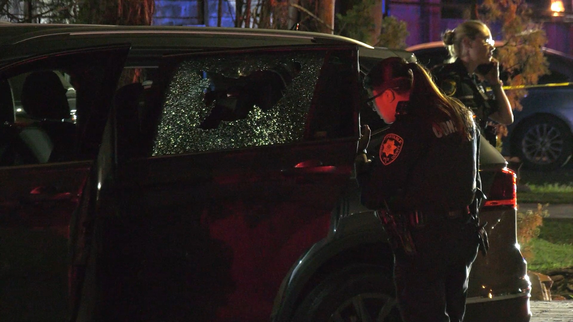 A 5-year-old was hurt by shattered glass after the driver of a red Honda shot a back window out, according to police.