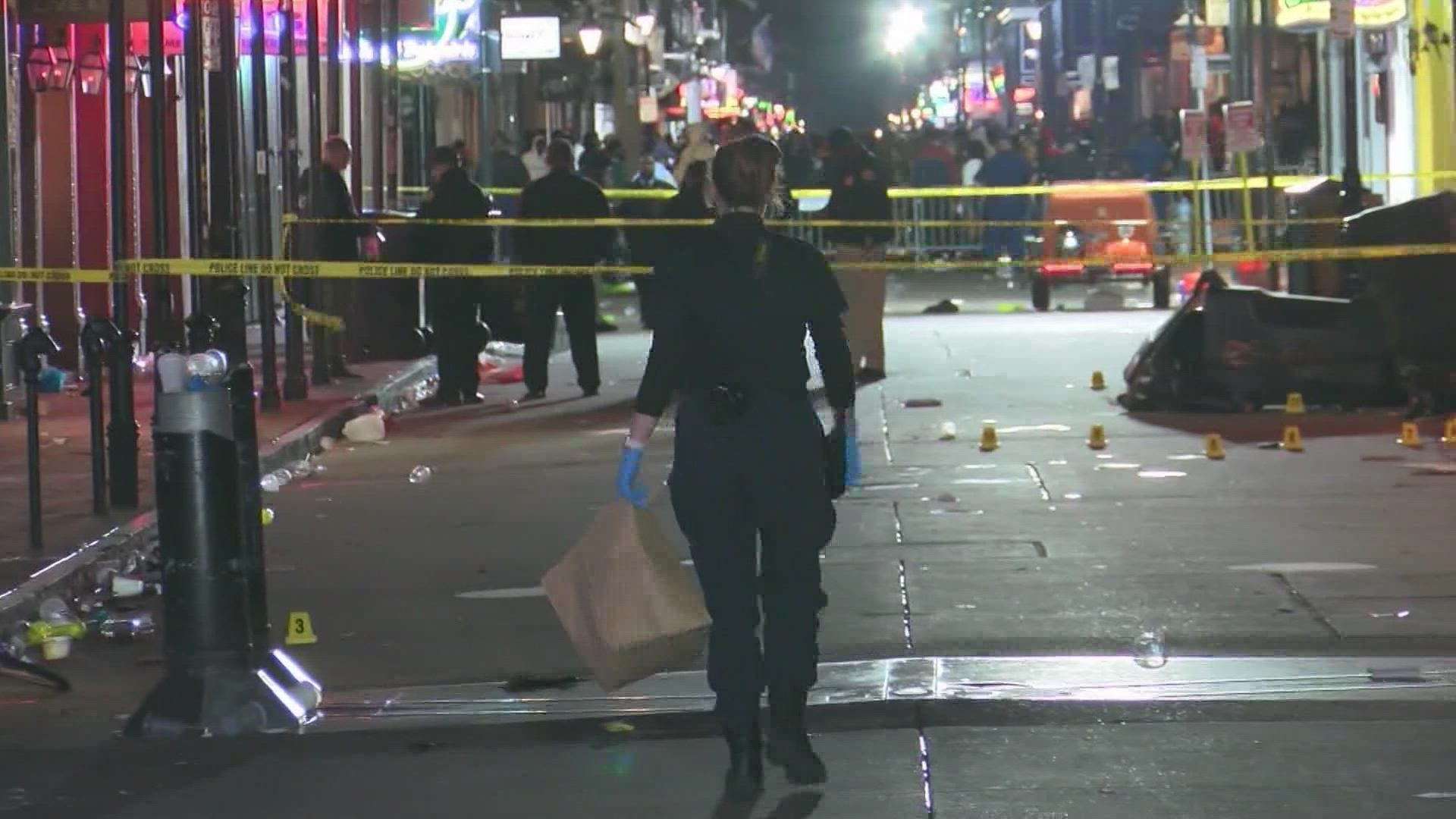 Two people were detained for questioning after the shooting on Bourbon Street near Canal Street.