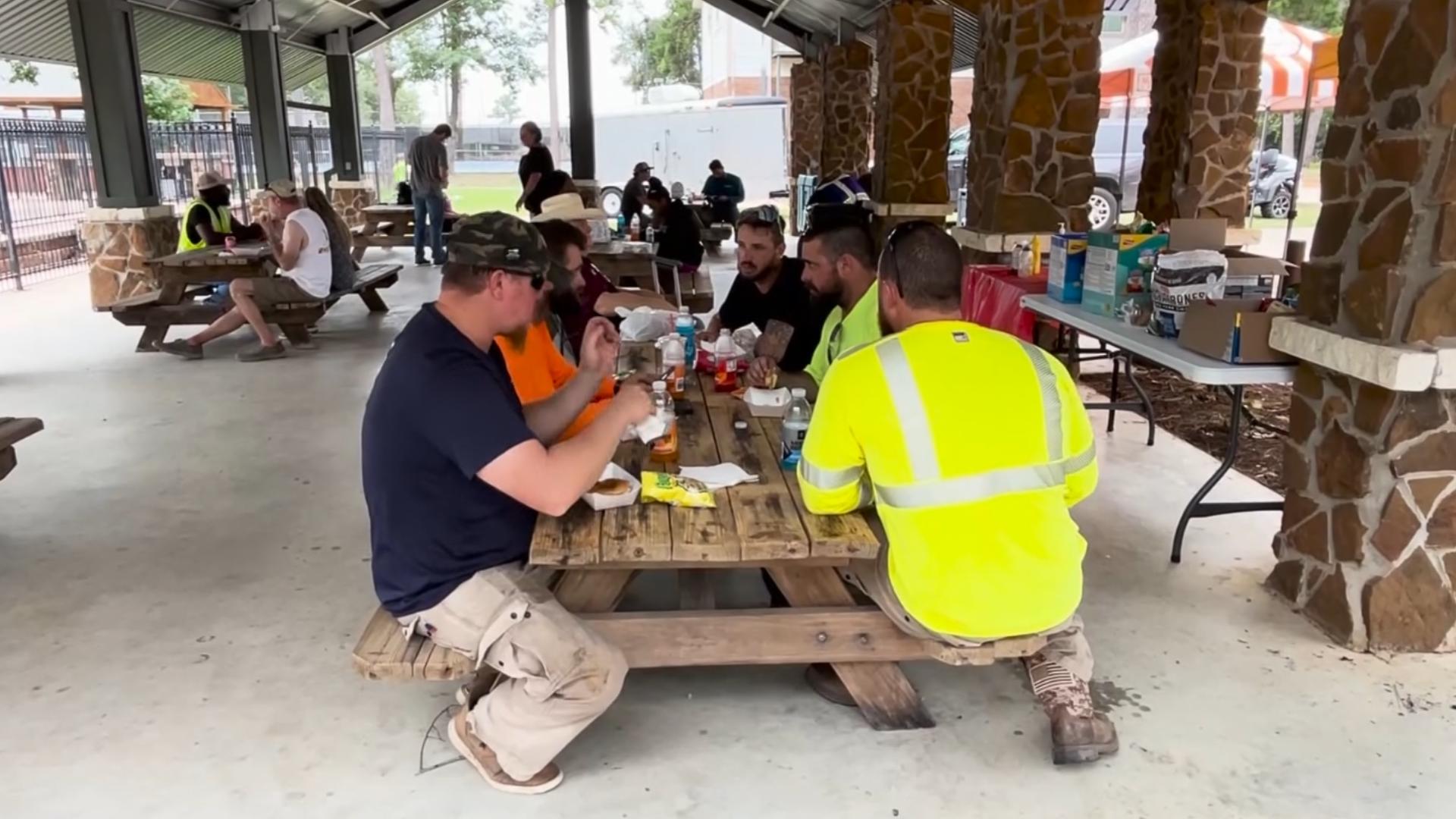 Residents in the Northhampton neighborhood of North Harris County are showing CenterPoint line crews working to restore power appreciation by feeding them.