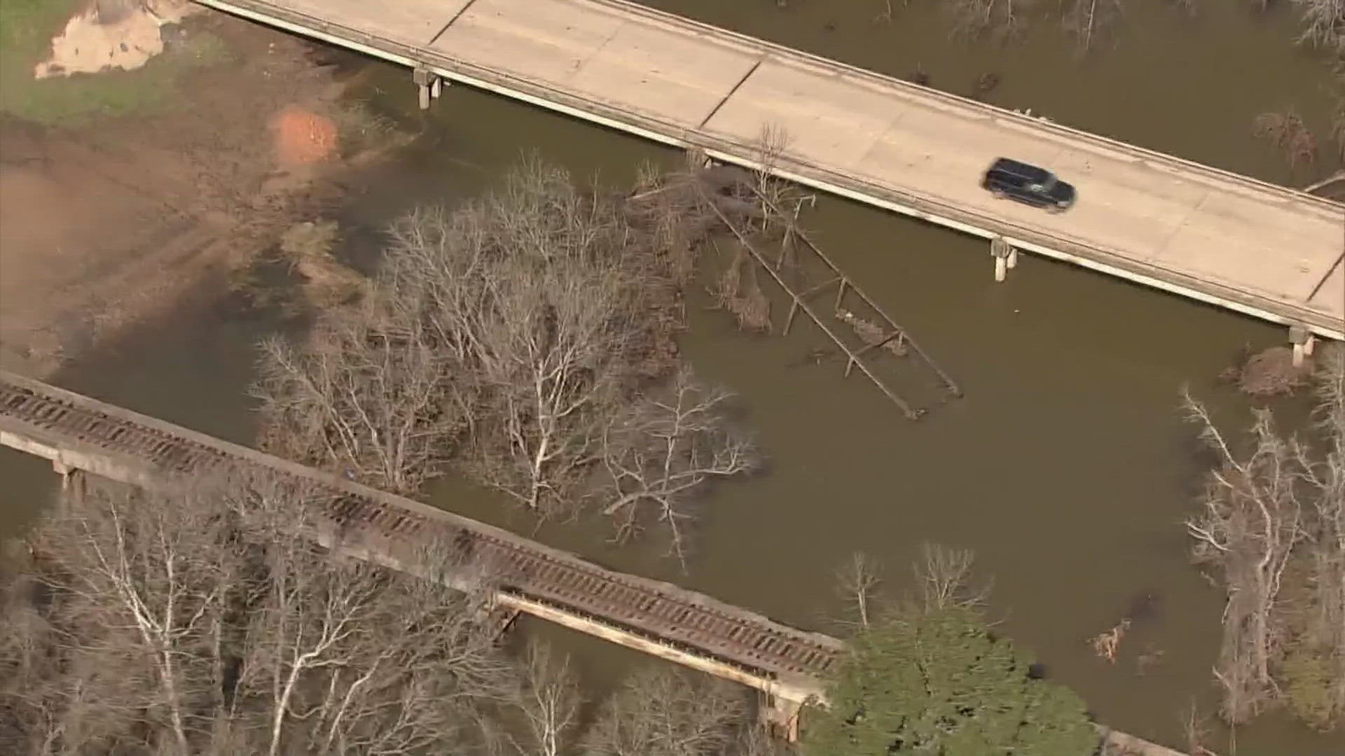 Along FM 2854 in Conroe, floodwaters from the San Jacinto River washed away what's referred to as the "Bonnie and Clyde" bridge.