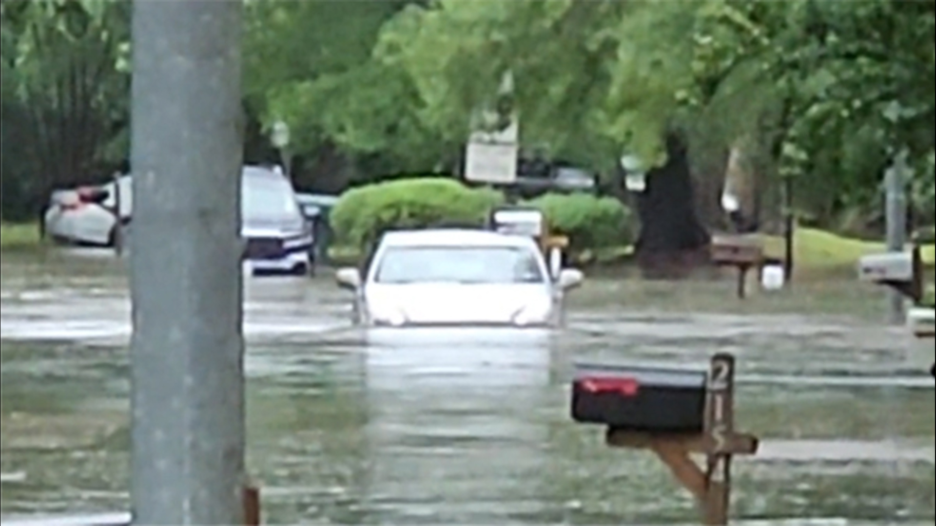 This video was sent in by Sarah Byron, showing a driver trying to navigate a flooded road in Humble.