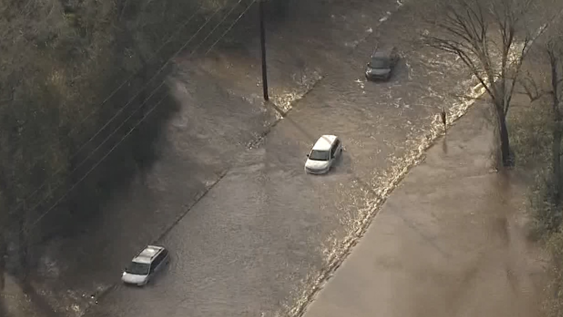 Air 11 saw three cars stranded on a flooded road in northwest Harris County Thursday morning.