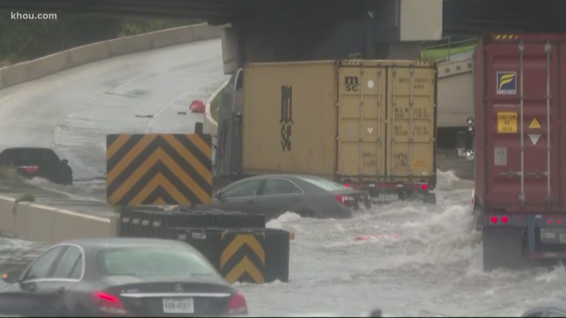 Floodwaters along the Katy Freeway at the West Loop finally began to recede late Thursday afternoon, letting traffic move who had waited for hours.