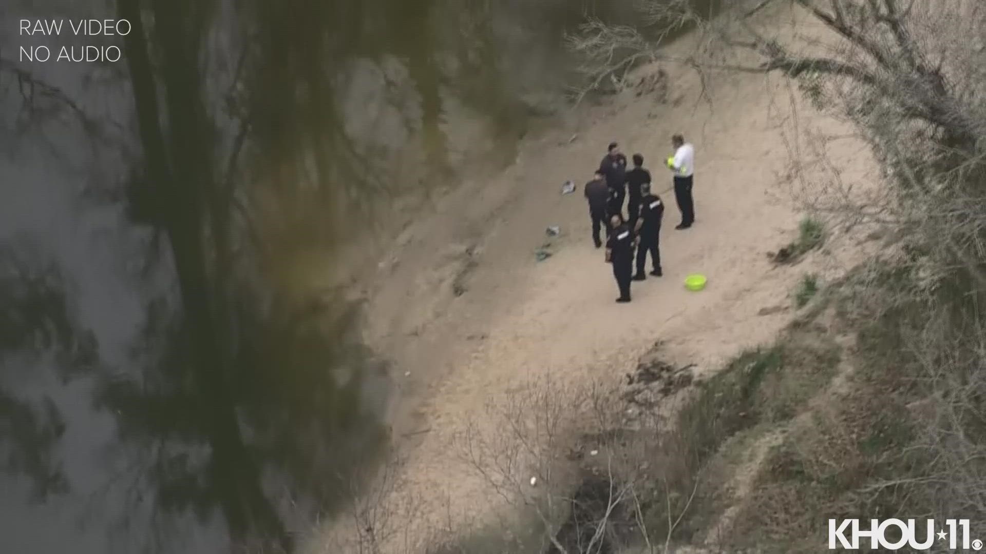 Aerials of authorities searching for a teen who they said fell into the water near the 21400 block of Cypresswood Drive, which is just north of FM 1960.