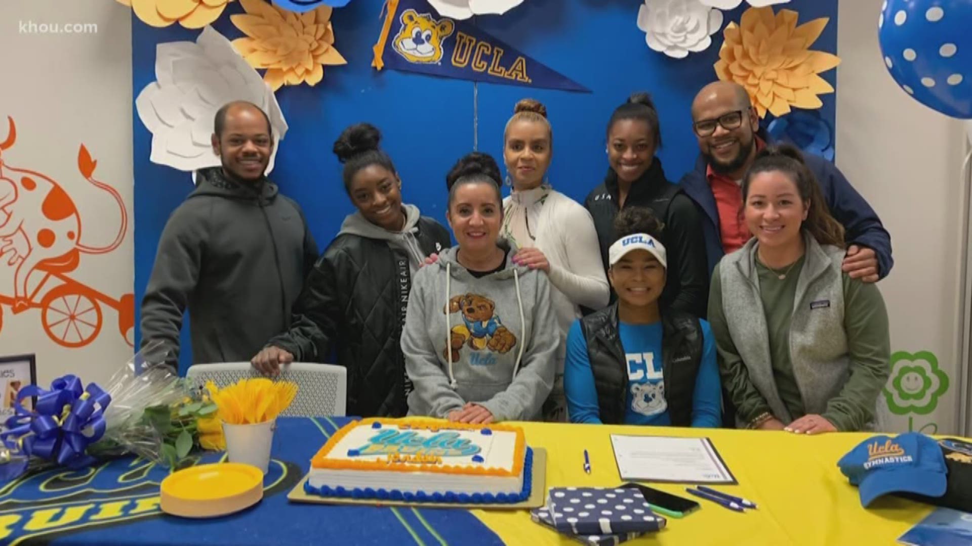 Two gymnasts who train at the World Champions Centre in Spring signed their letters of intent as part of National Signing Day with Simone Biles by their sides.