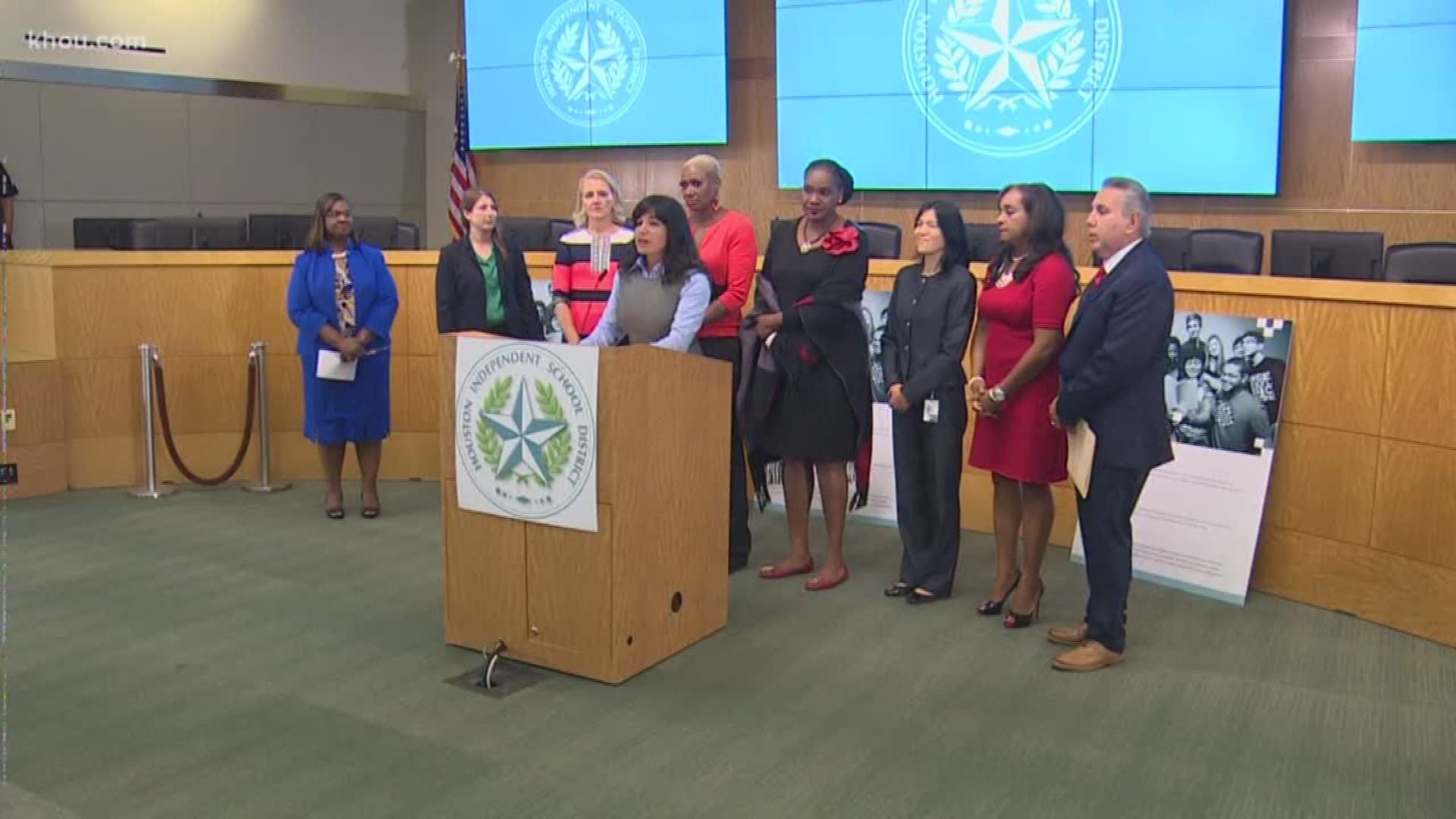Members of the Houston Independent School District apologized for arguing and removing Superintendent Dr. Grenita Lathan.  The board reinstated Lathan Monday evening.