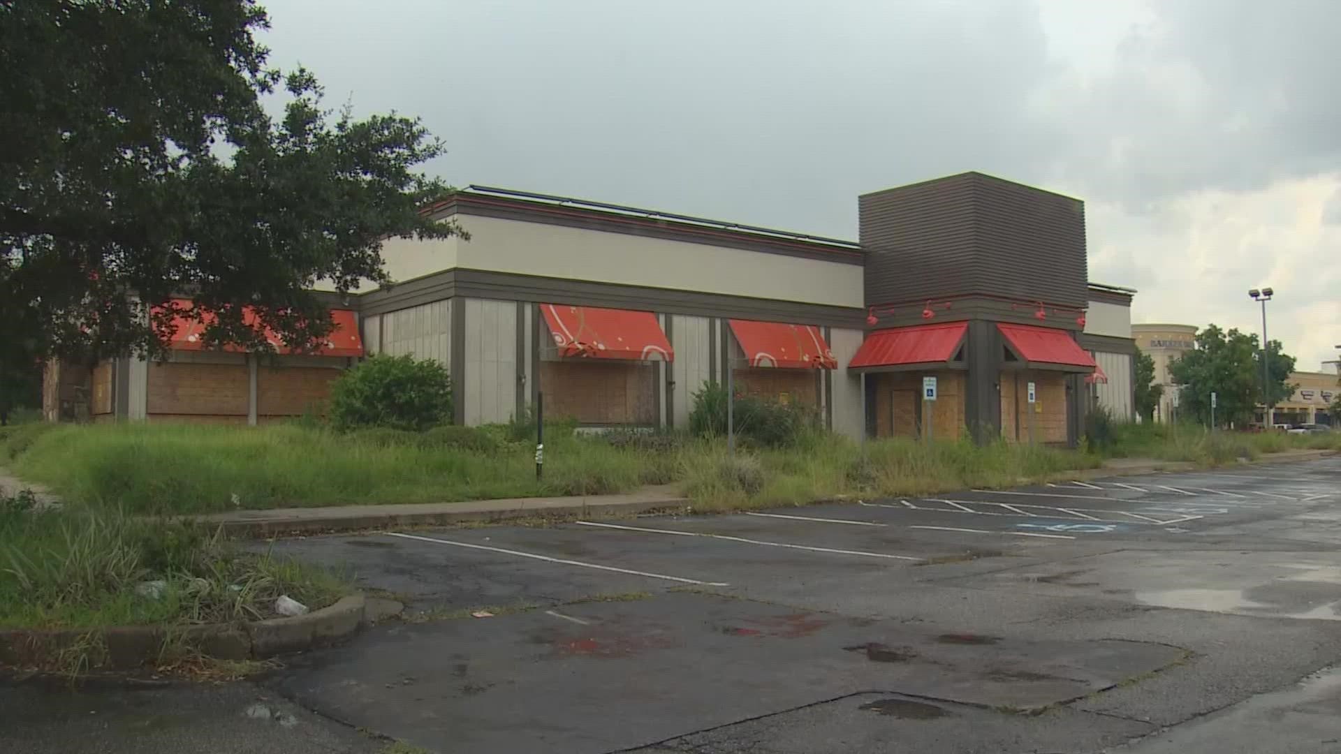 One family is working to turn an old restaurant into a car lot and showroom, but rebuilding has been slow.