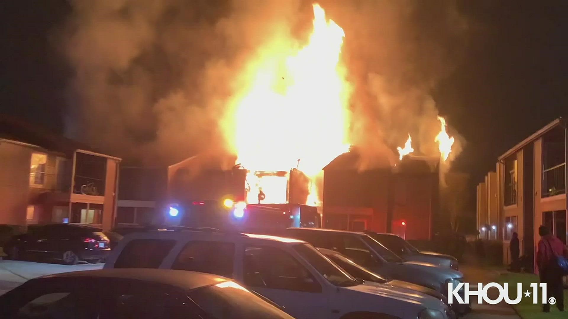 Fire crews had their hands full with a two-alarm apartment fire in southwest Houston Tuesday night.