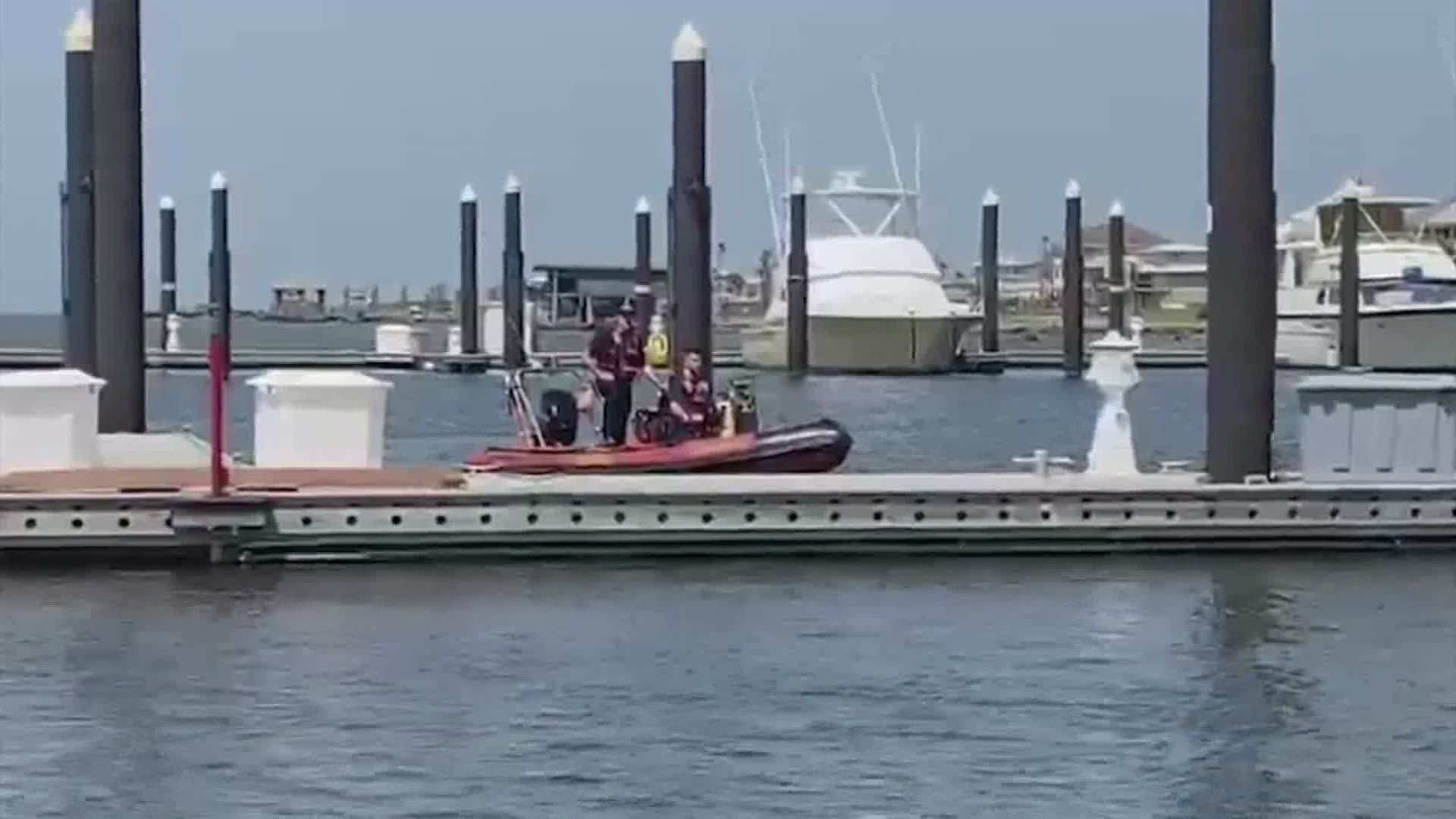Galveston police are searching for possible witnesses after a man who went overboard in a marina Saturday morning was later found dead in the water.