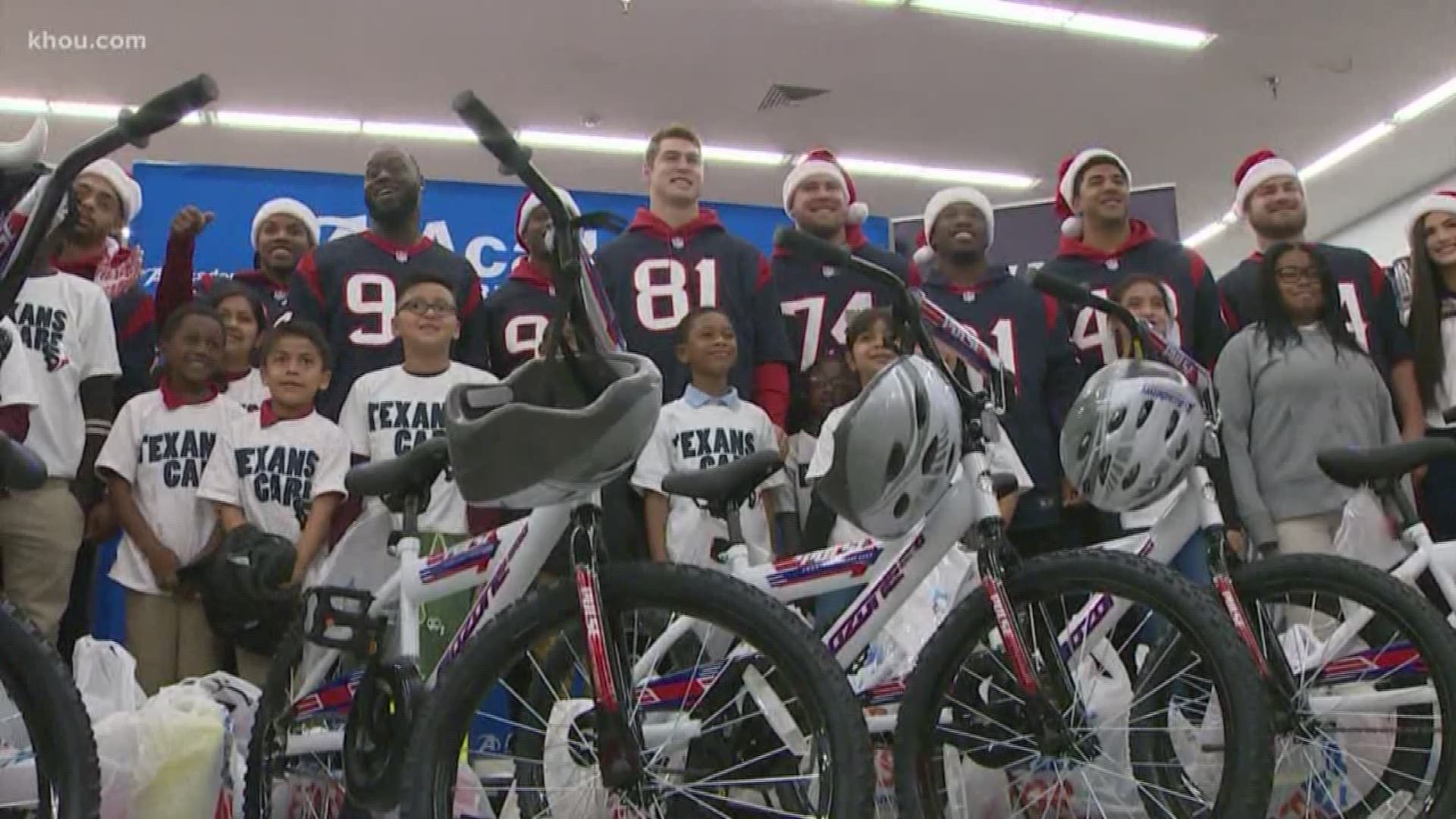 Houston Texans rookies took several children on a holiday shopping spree at Academy Sports + Outdoors Tuesday morning.
