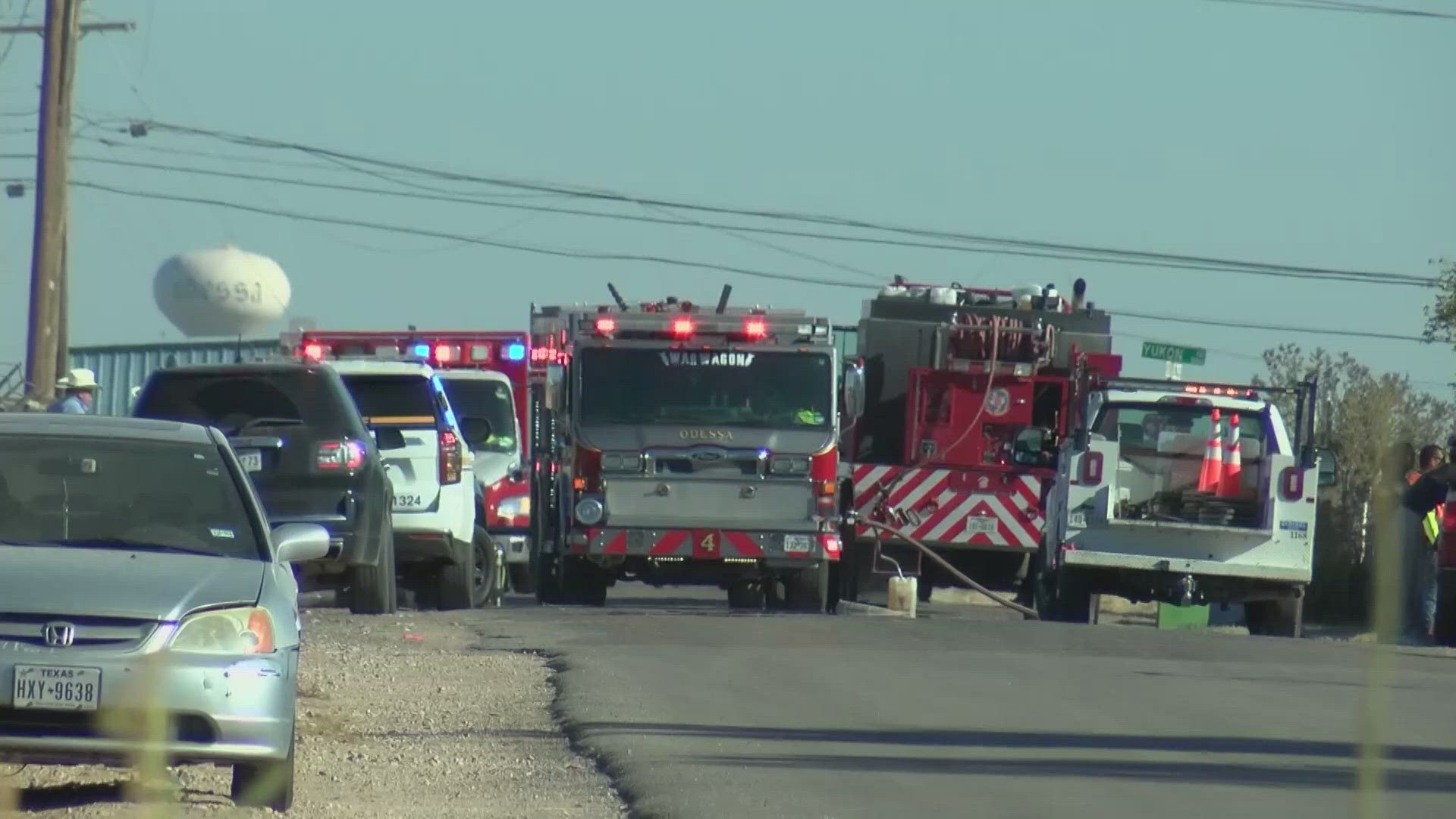 A small plane crashed in a West Texas neighborhood Tuesday, killing the pilot and a passenger and setting off a large fire on the ground.