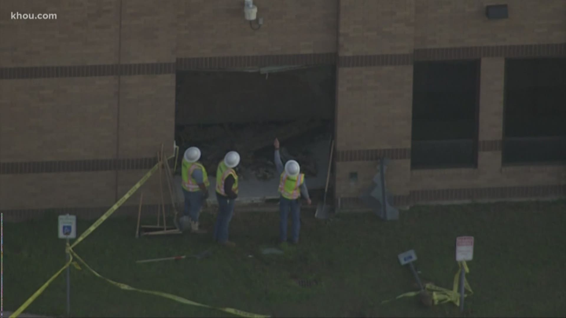 A Langham Creek High School employee drove into a wall of the school Monday morning.