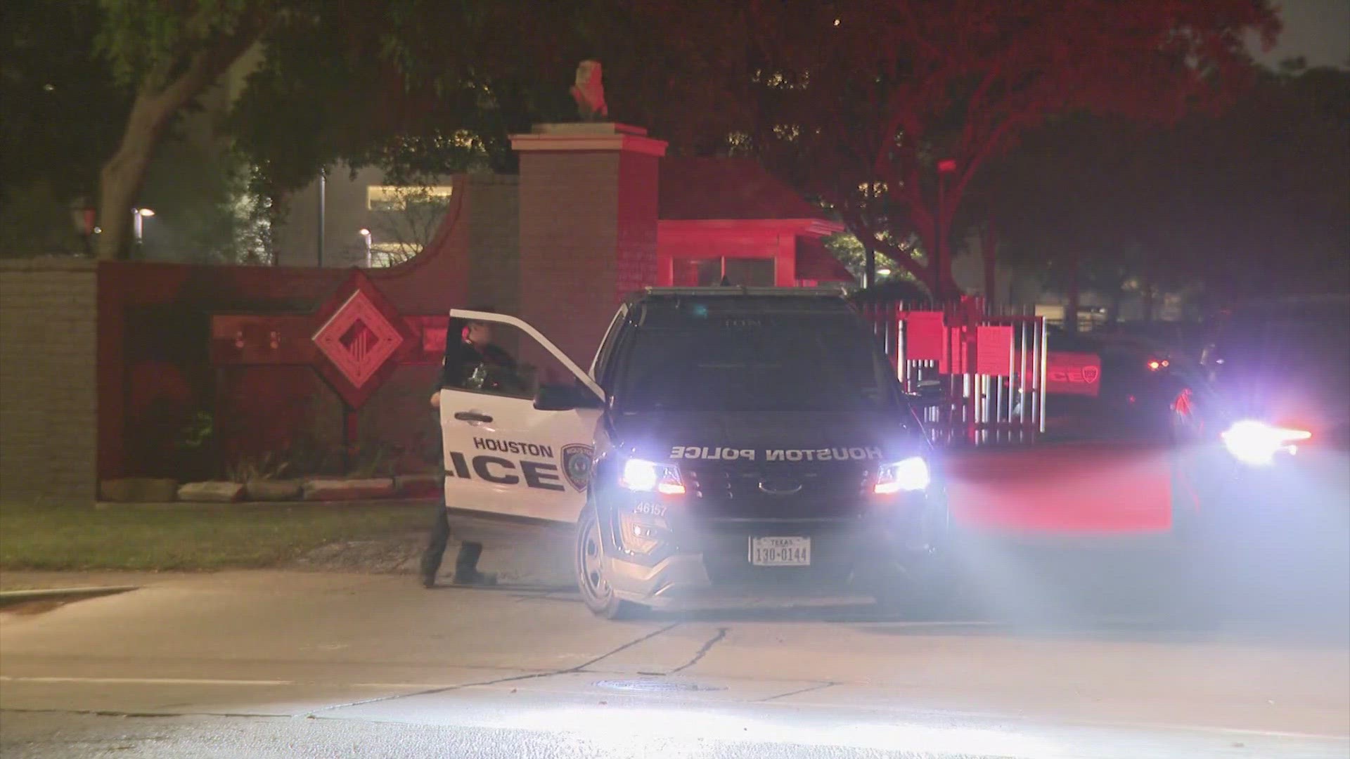 Houston police say the SWAT standoff started after a woman in a neighboring building was shot in the foot.