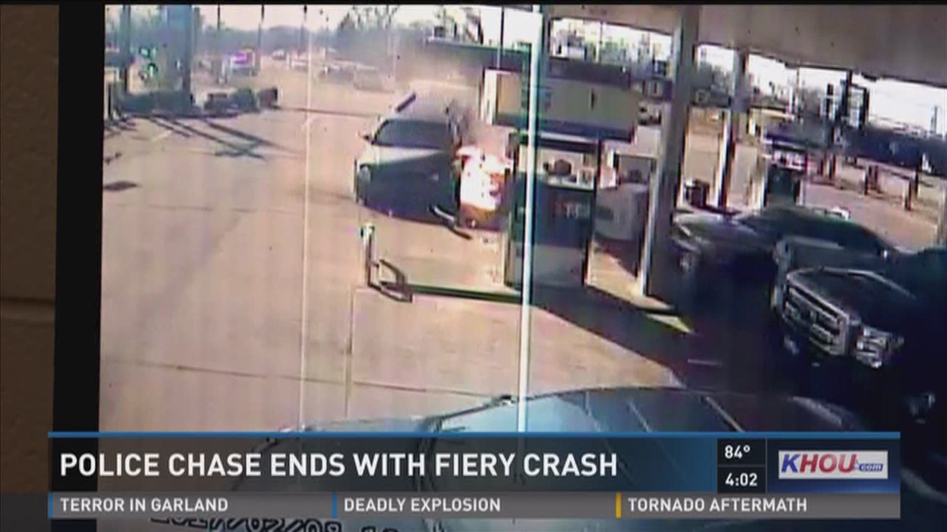 Firefighters battled big flames at a Chevron gas station in north Houston Wednesday after a chase ended in a fiery crash. As security cameras rolled, the SUV hopped a curve, hit a truck, crashed into a gas pump and burst into flames.