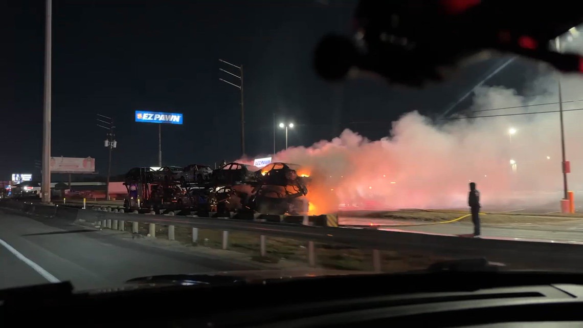 18-wheeler hauling cars engulfed in flames along Houston freeway