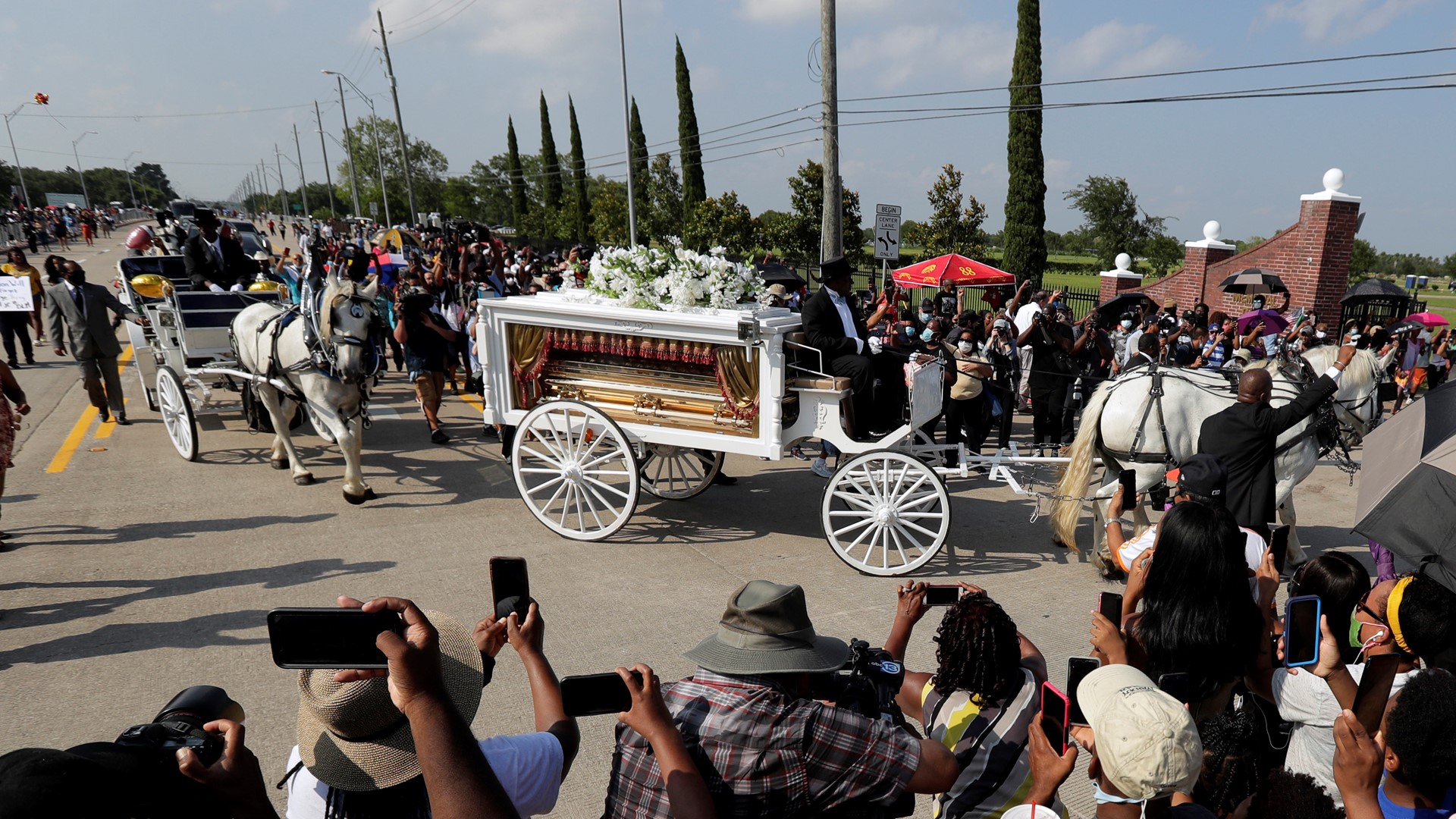 A horse-drawn hearse transported Floyd's body during the final mile of his funeral procession