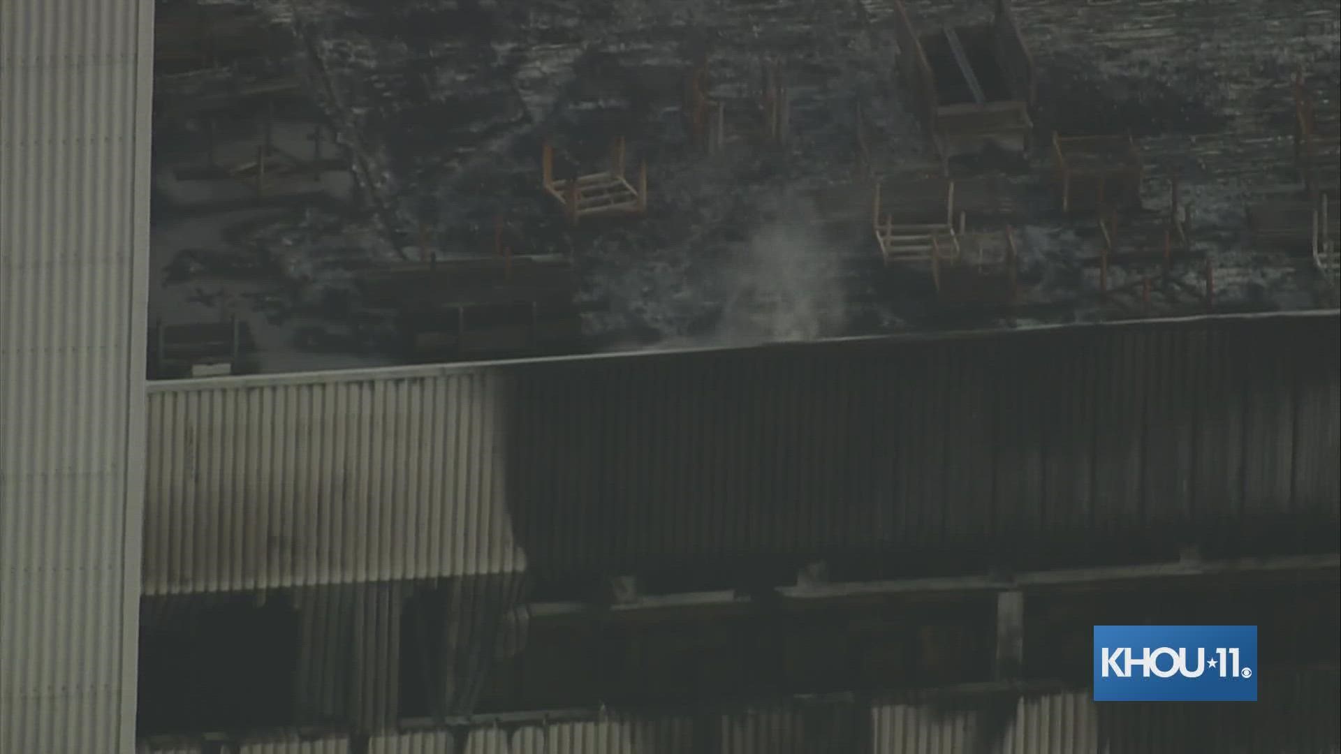 A spokesman for NRG Energy said around 5 a.m. that the fire is out and that crews are just monitoring for hot spots.