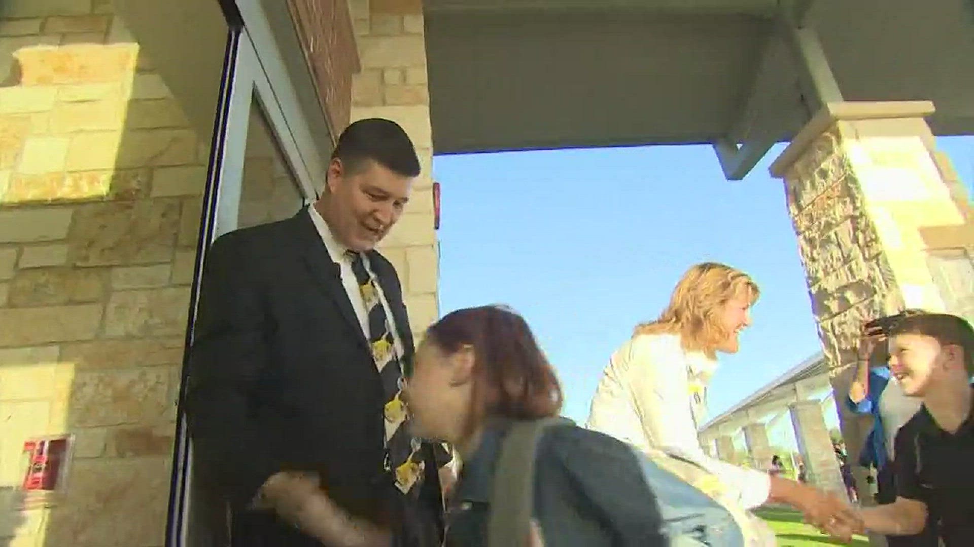 As the crowd grew outside the doors of Katy ISD's Bryant Elementary Wednesday morning, so did the smile on Superintendent Lance Hindt's face. When the time came for a memorial photo, he was ready.