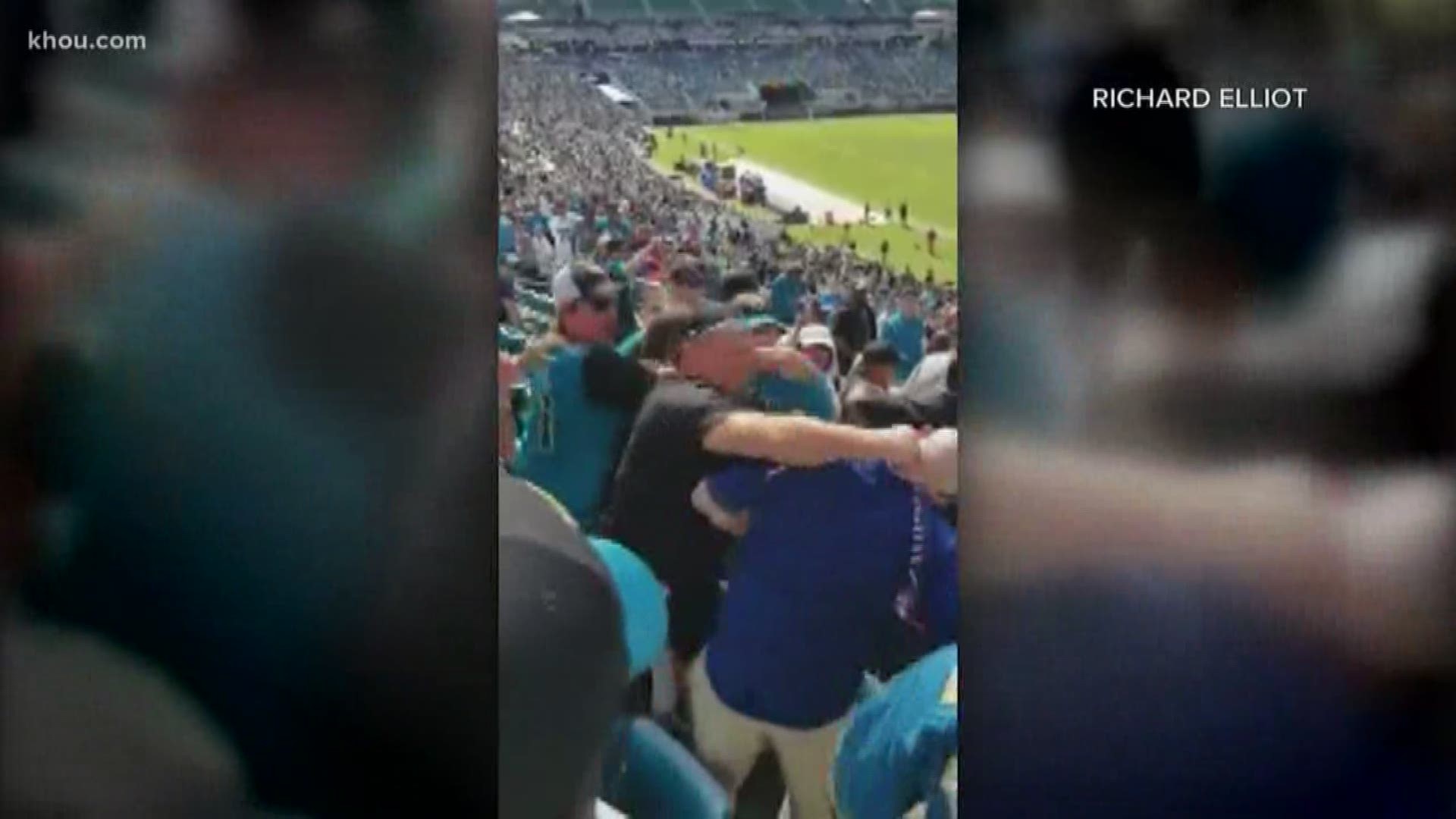 Two fans involved in an altercation at the Texans-Jaguars have been banned from buying tickets to Jaguar games, the team announced Monday.