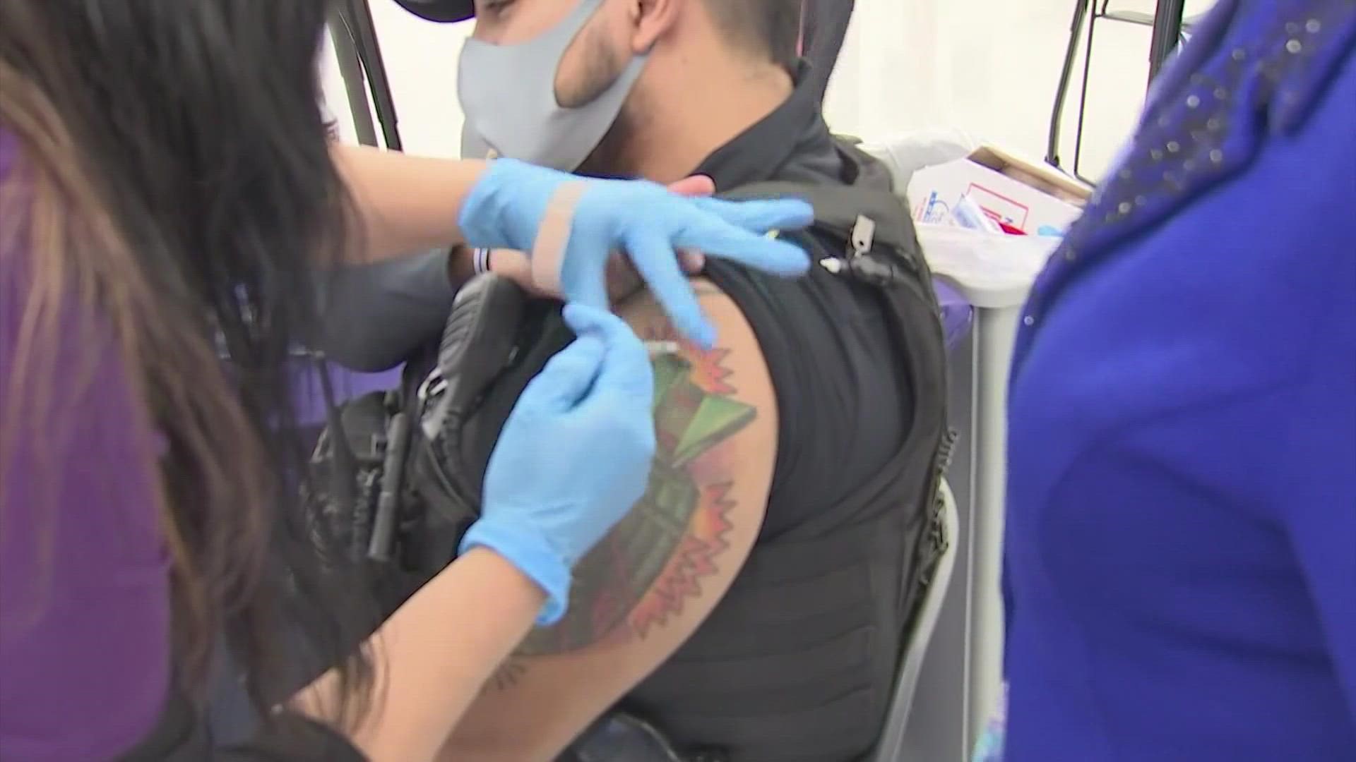 Members of the Houston Police Department got vaccinated during the neighborhood outreach event, which also focused on children and seniors.