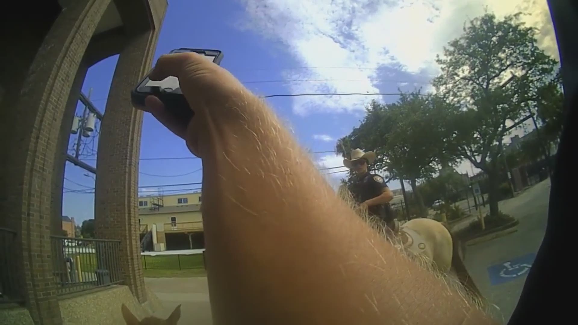 Body cam footage from two mounted Galveston police officers released Wednesday shows the controversial arrest of Donald Neely as he is handcuffed and led by a rope.