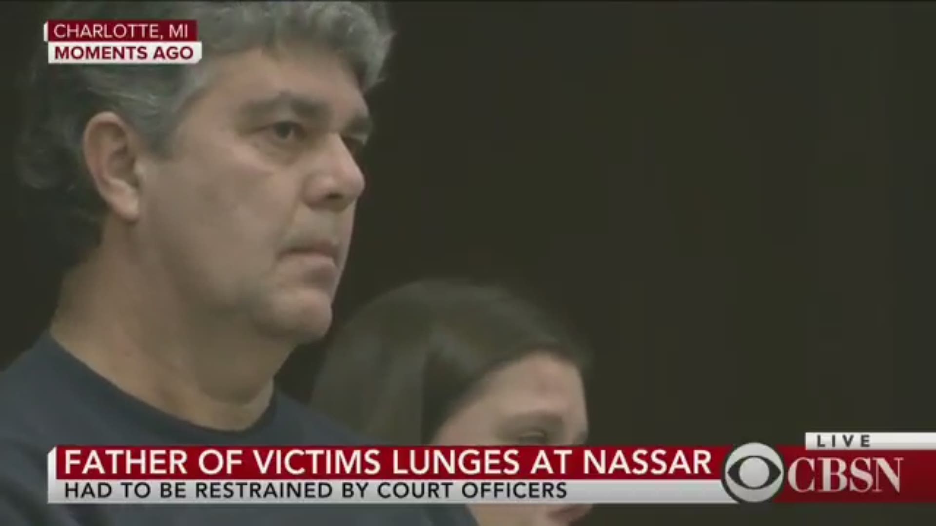 The father of victims of ex-USA Gymnastic doctor Larry Nassar lunges at Nassar in court after saying to judge, "I would ask you to as part of the sentencing to grant me 5 minutes in a locked room with this demon." ' CBS NEWS