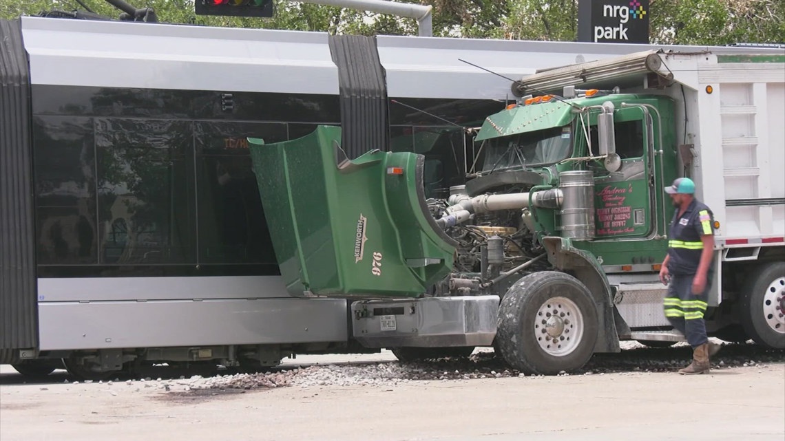 3 injured in crash involving METRORail Red Line and dump truck | khou.com