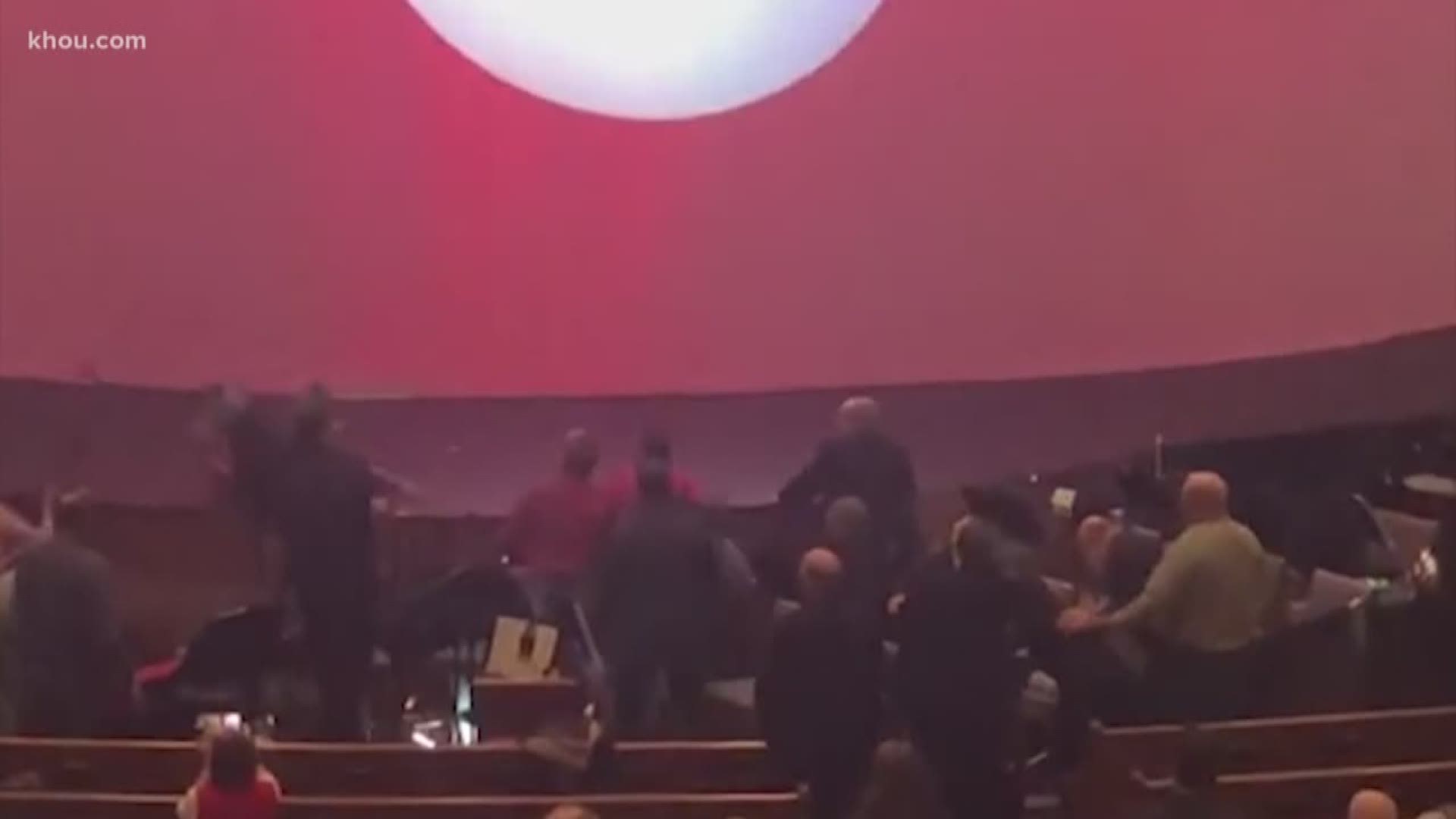 Wild chaos turned to applause inside a Pasadena church as a police chase disrupted a Christmas service before the suspect was hit with a music stand.