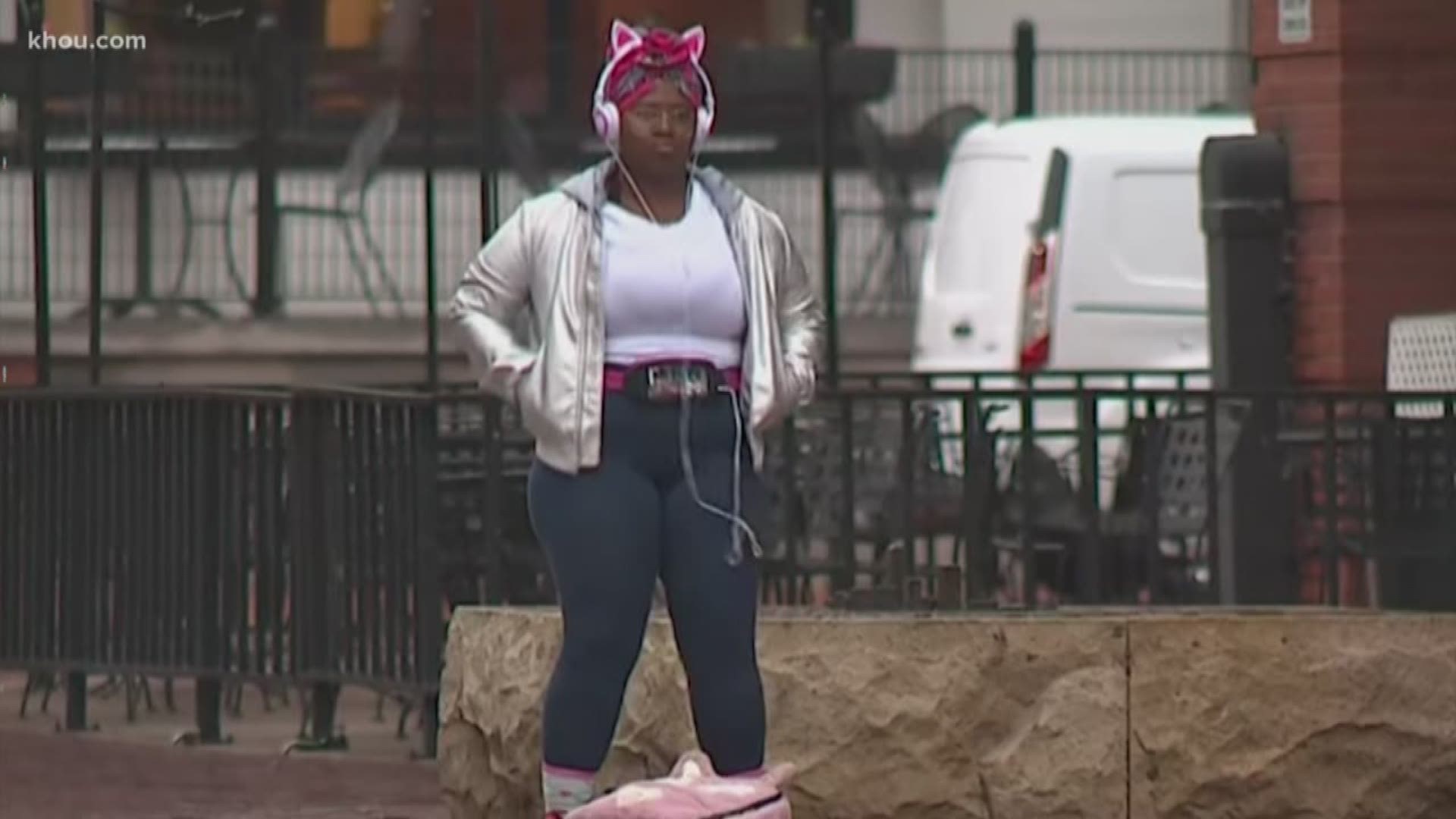 A photographer at our sister station in Dallas captured a woman dancing at a bus stop.