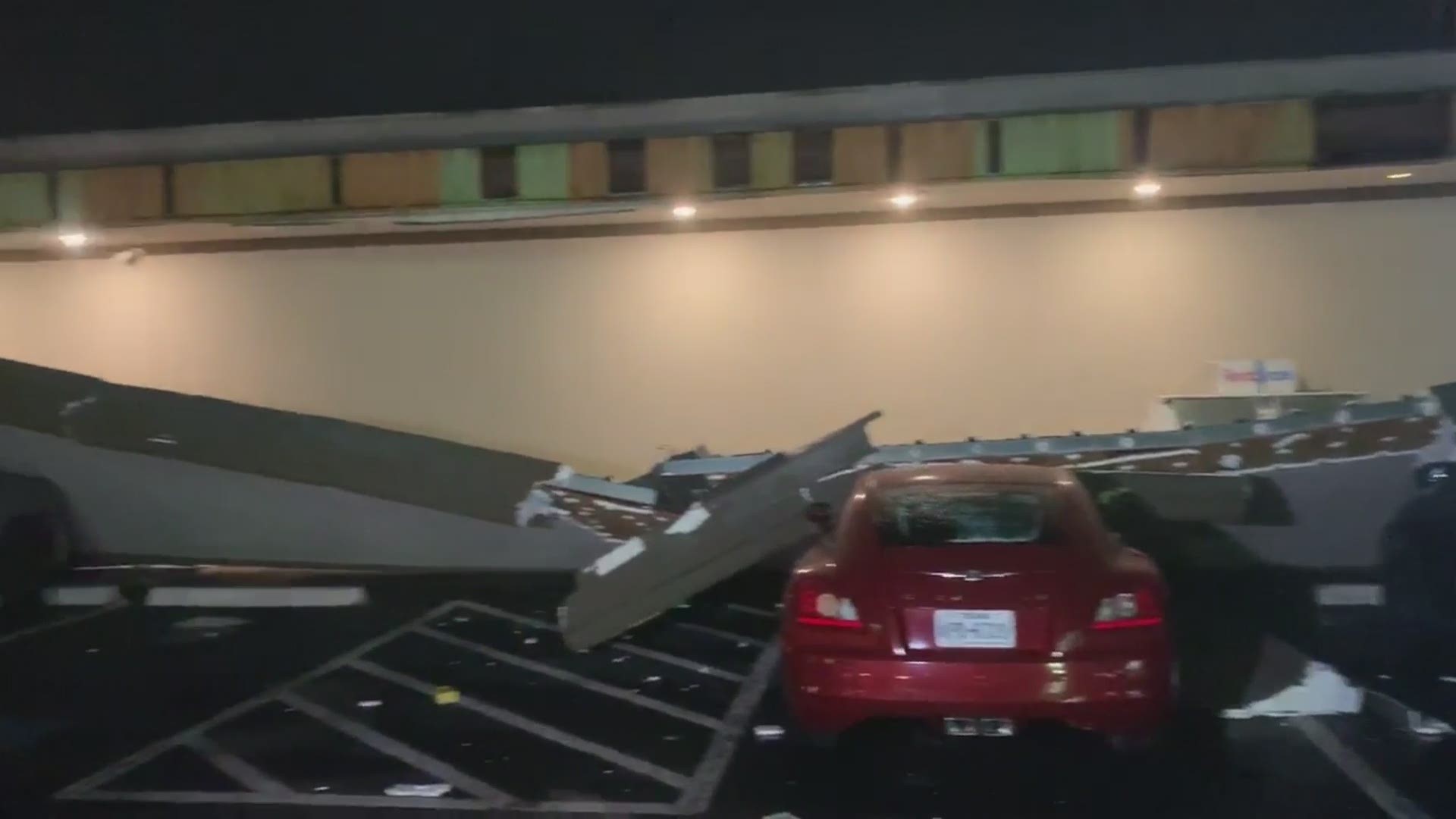 Storms Wednesday caused the awning at a Dollar General in Pasadena to come crashing down.
