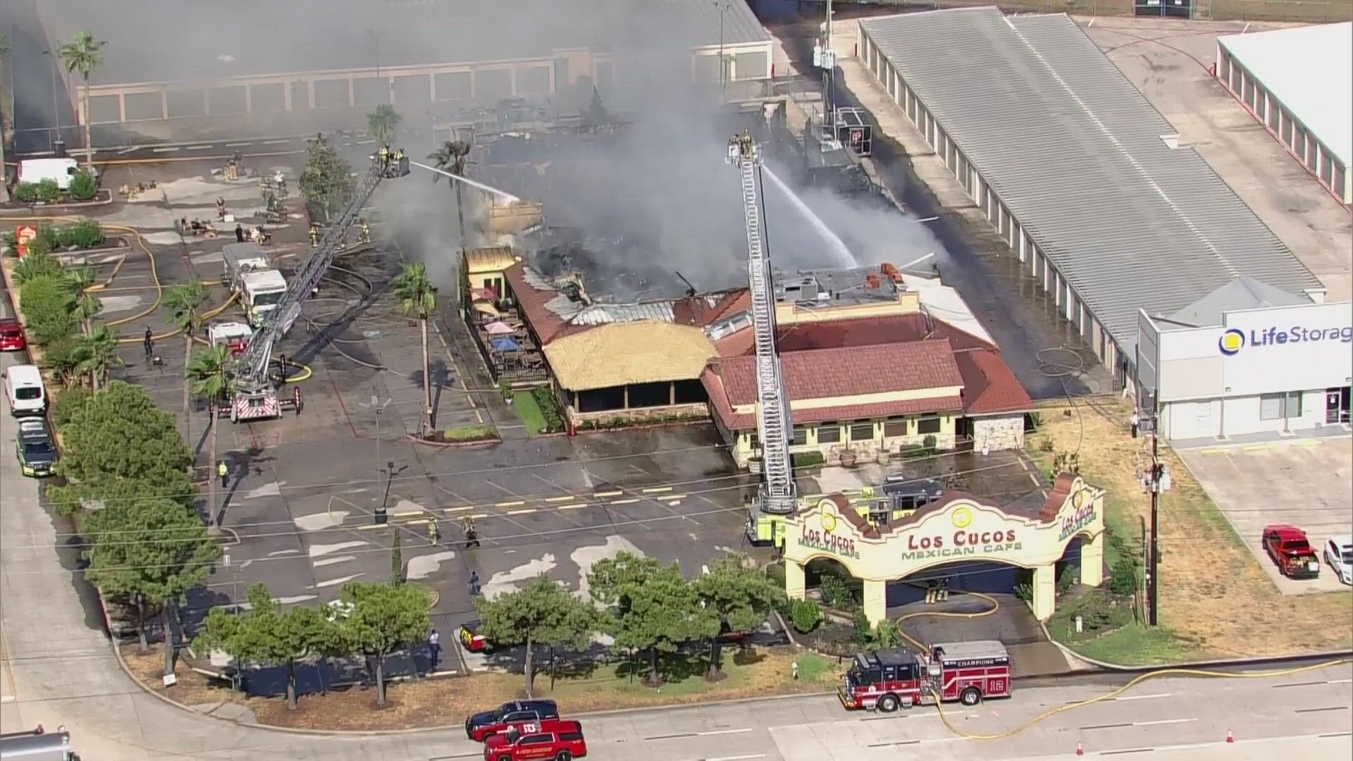 A Klein firefighter was taken to the hospital Wednesday while battling a large restaurant fire in northwest Harris County.