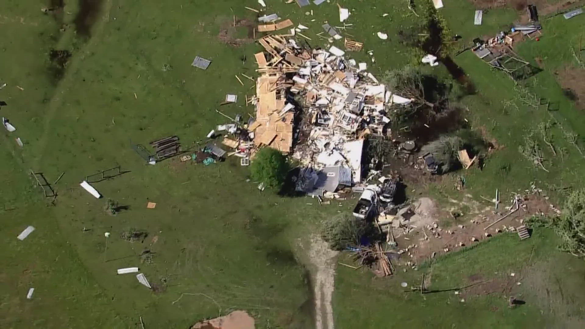 A Conroe police officer and his wife were injured when the tornado picked up and tossed their home like a cardboard box.