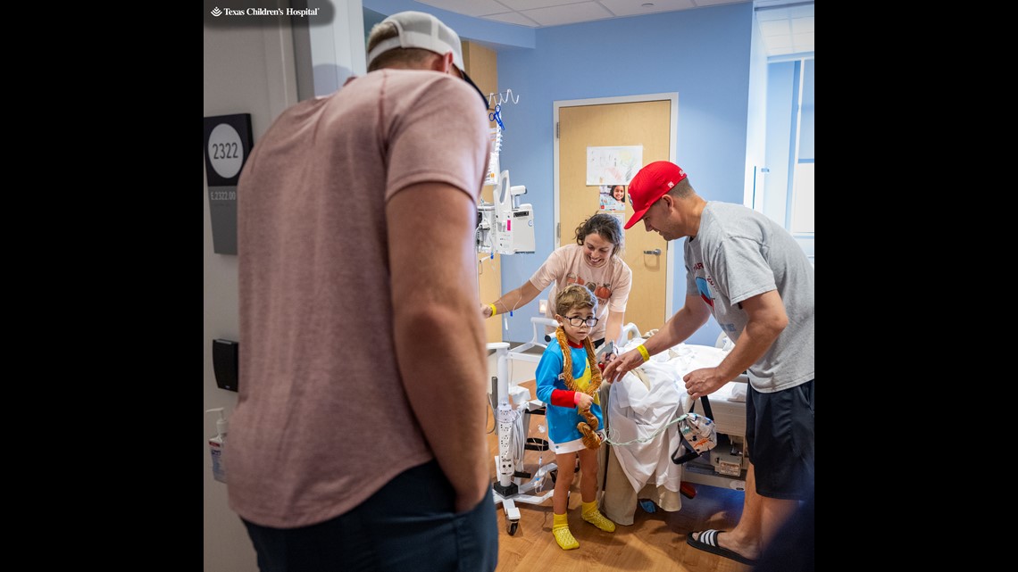 Texans' J.J. Watt delivers football jerseys to injured boy in hospital