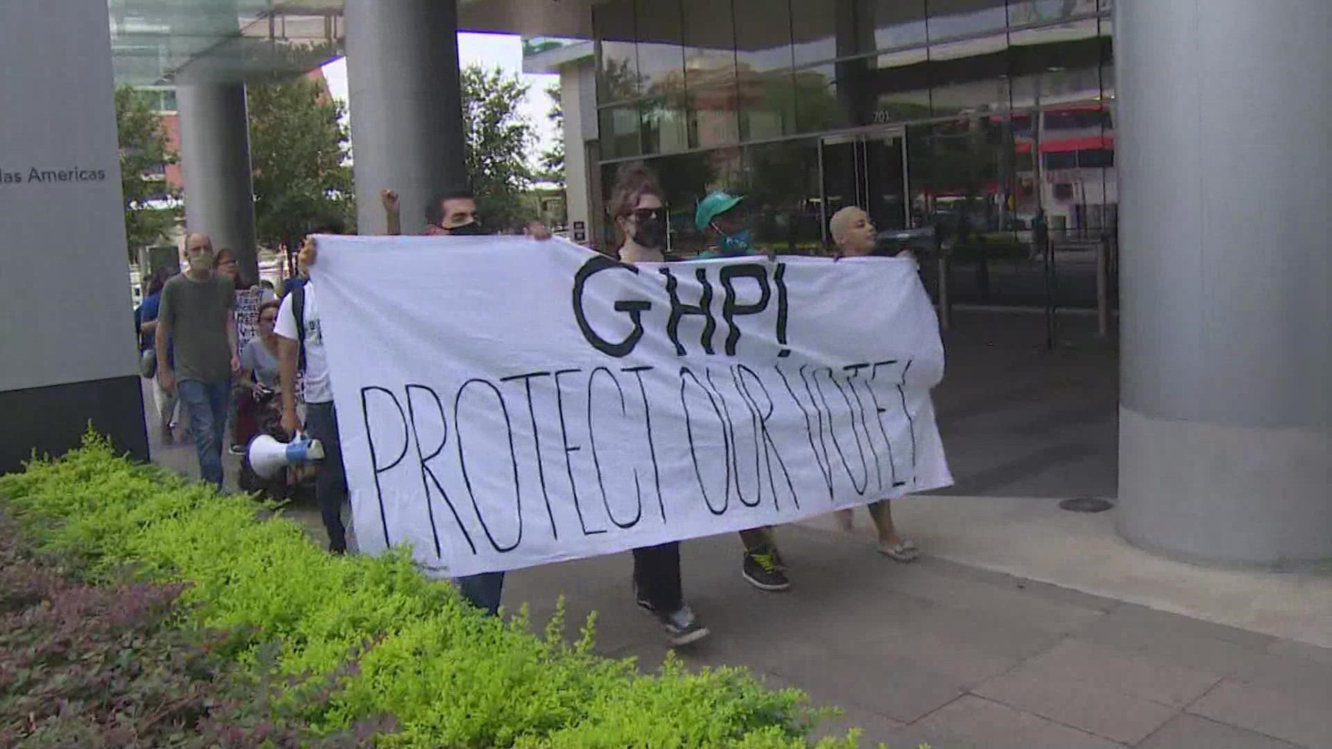 Local voting rights activists rallied outside the Greater Houston Partnership on Tuesday.