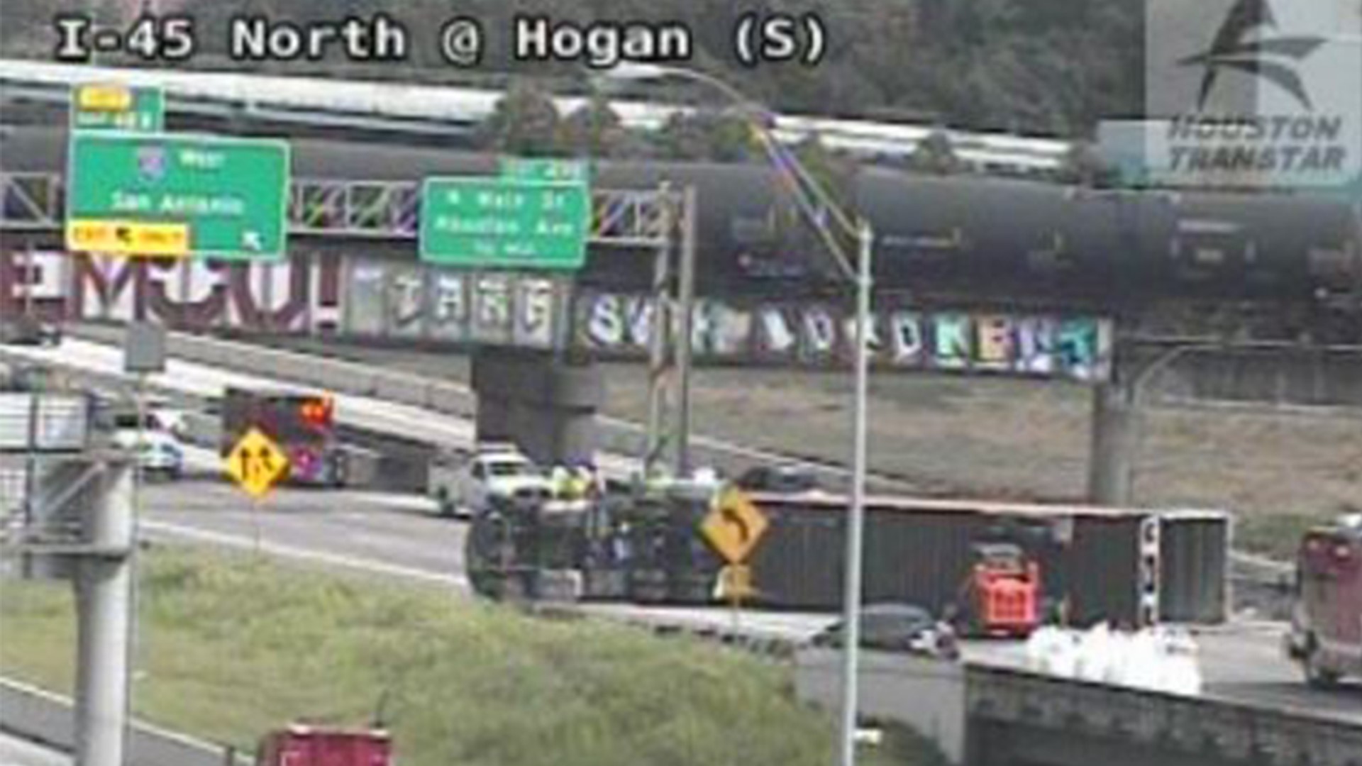 North Freeway closed at Hogan due to overturned 18wheeler
