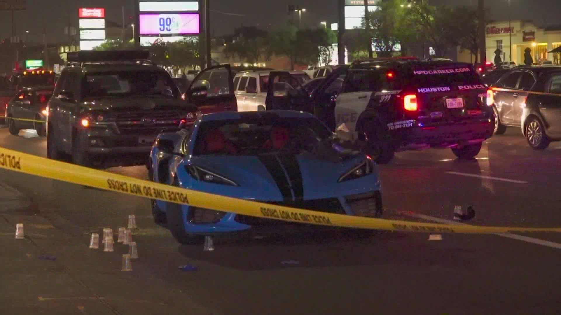 Houston police are hoping surveillance video will lead them to the gunman who shot two men sitting in a blue Corvette late Saturday night in west Houston.