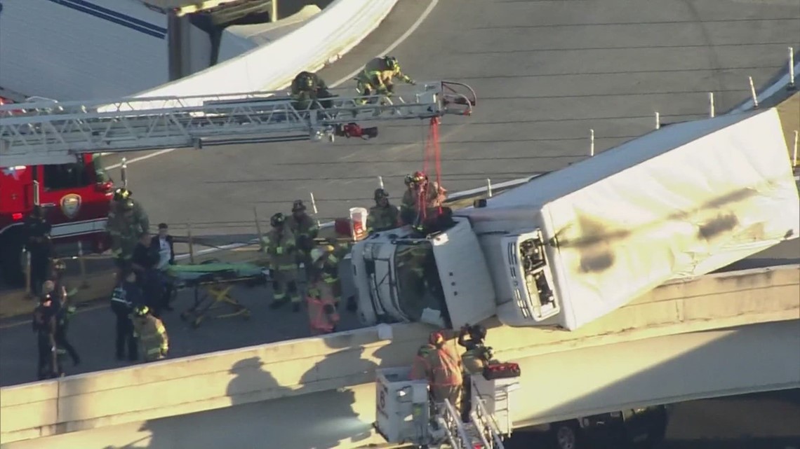 Houston, Texas traffic | Truck driver rescued on North Freeway