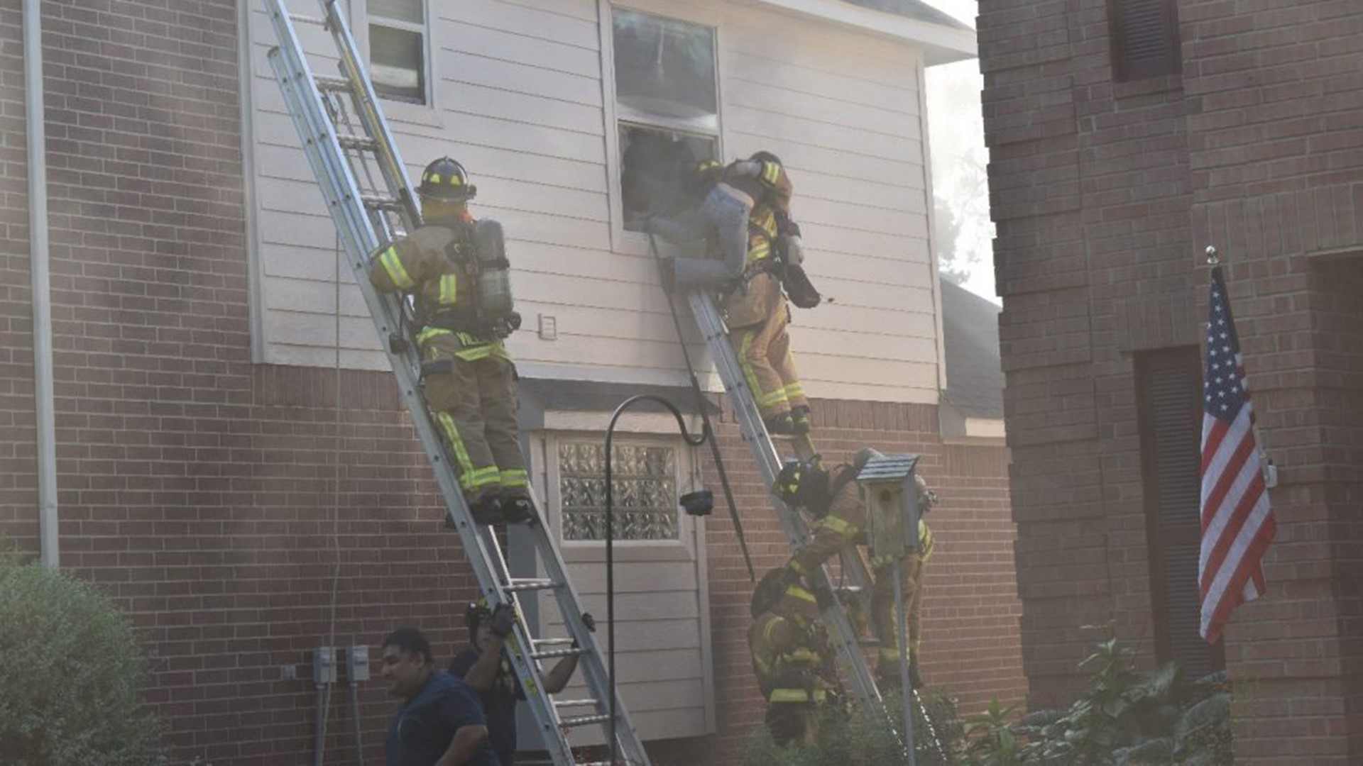 Spring firefighters rescue woman trapped in burning home | khou.com