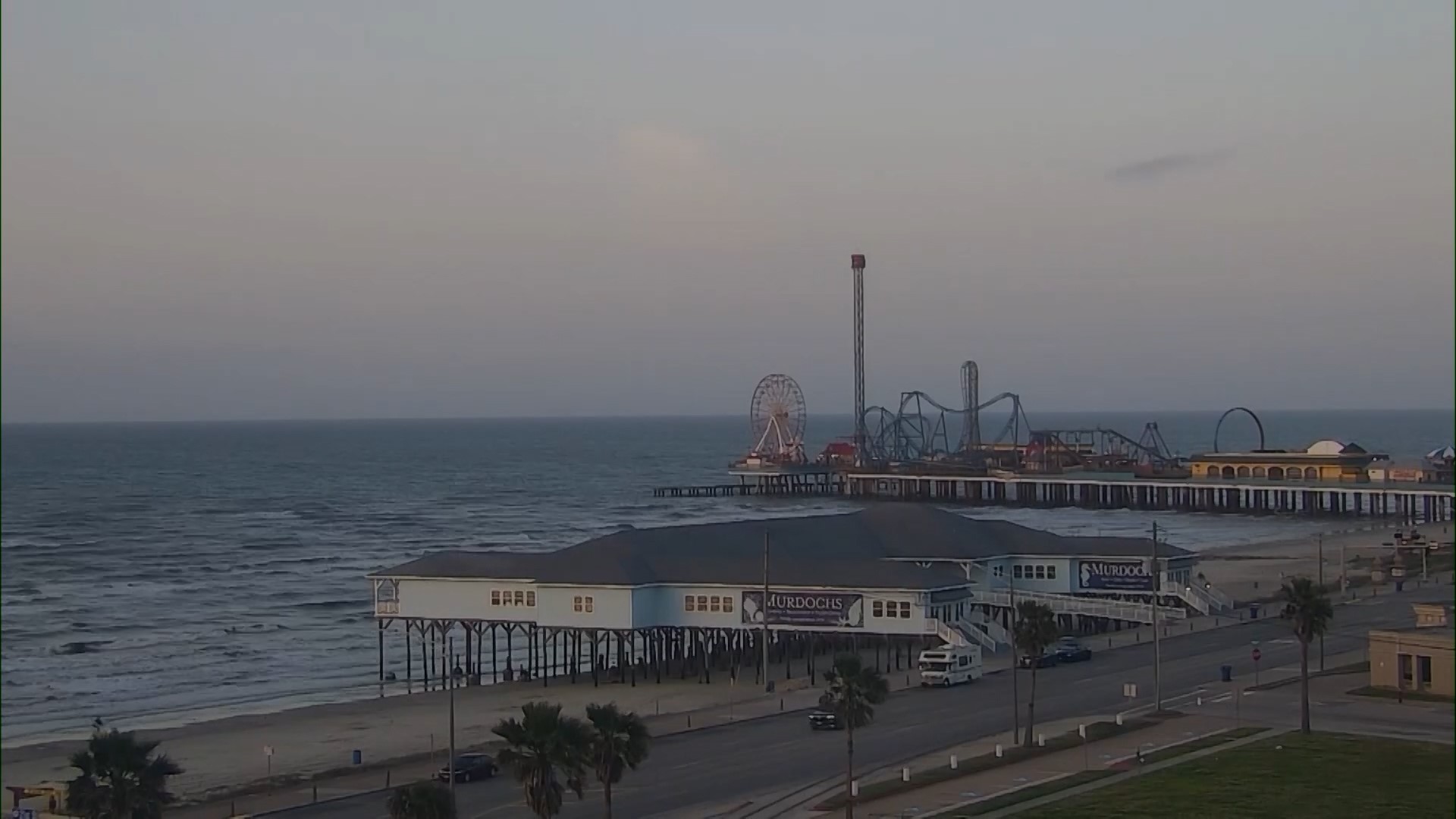 Watch the sun rise over Galveston Island.