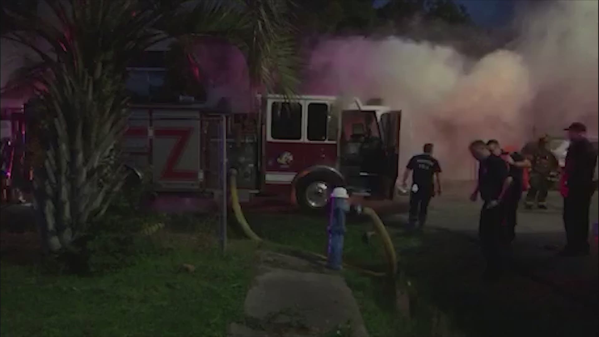 A Houston Fire Department truck caught fire while trying to battle a blaze at a warehouse in the Second Ward.