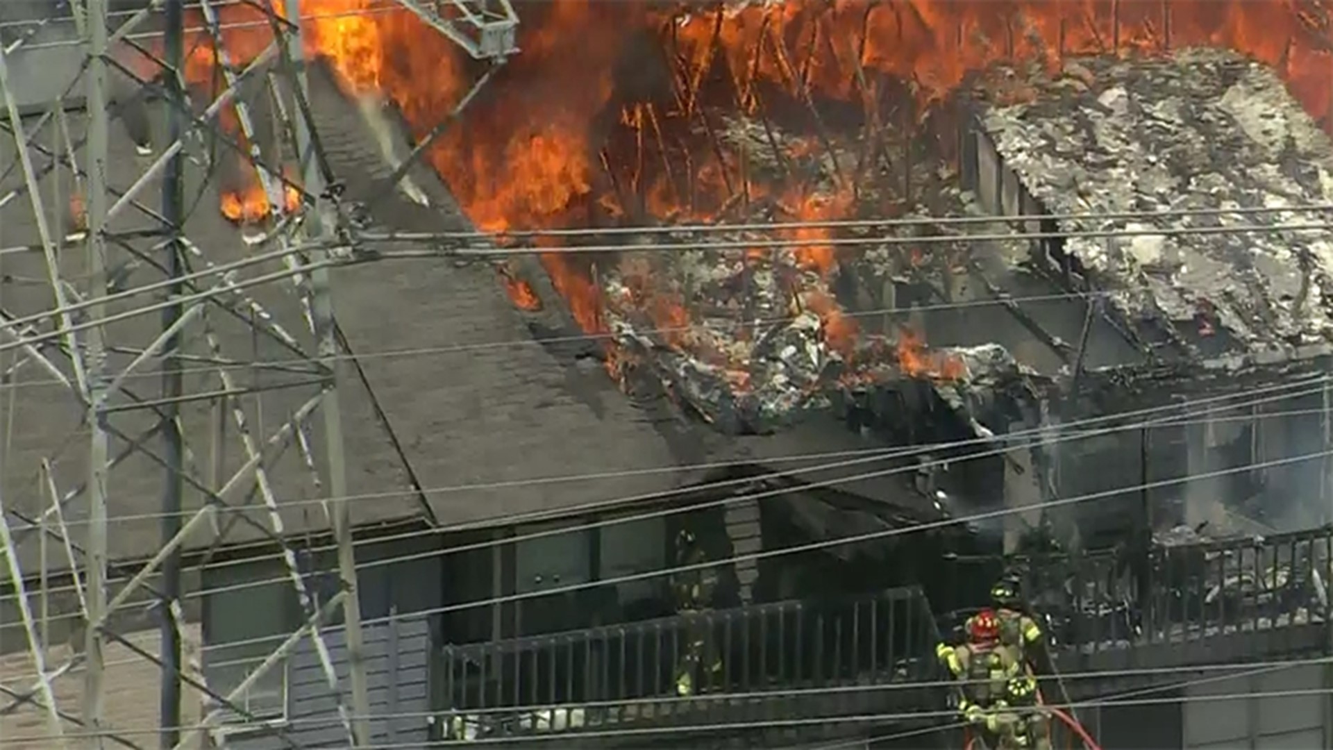 Flames were shooting through the roof of multiple units when Air 11 flew over the scene on Court Glen in the Alief area.