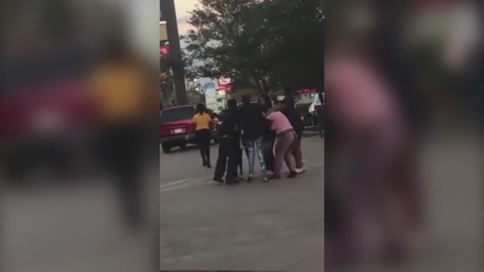 RAW VIDEO: Adults caught on video brawling in Beaumont Chuck E. Cheese's parking lot