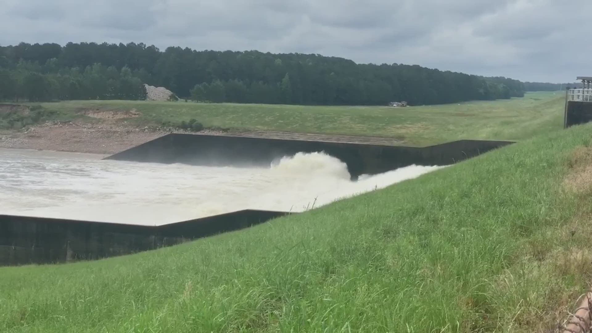 Water flows through the spillway at the Toledo Bend Reservoir Friday morning